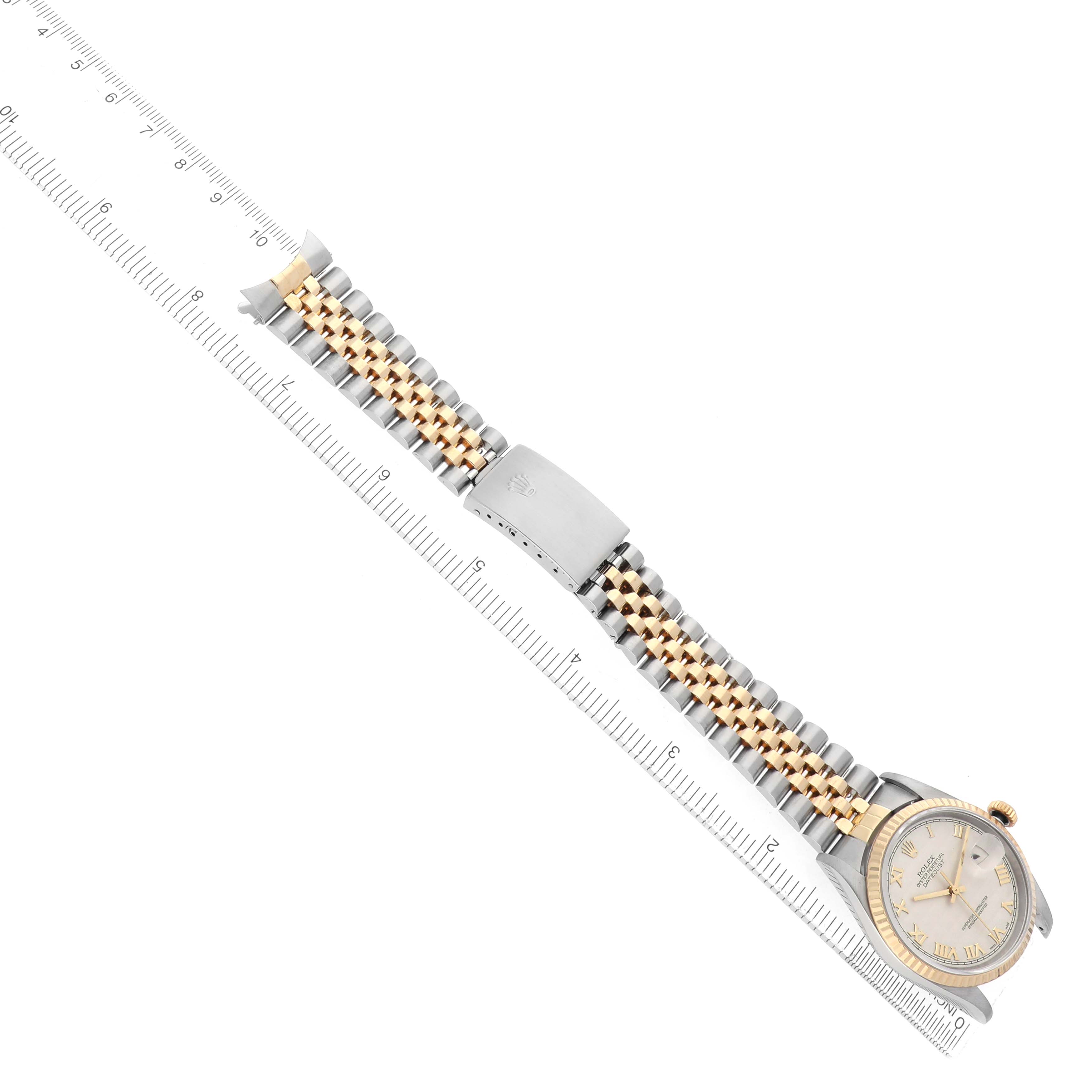 The Rolex Datejust 16233 Men's Steel and Gold (two tone) White Dial watch is shown from a top-down angle, highlighting the dial, bezel, and two-tone bracelet with a clasp.