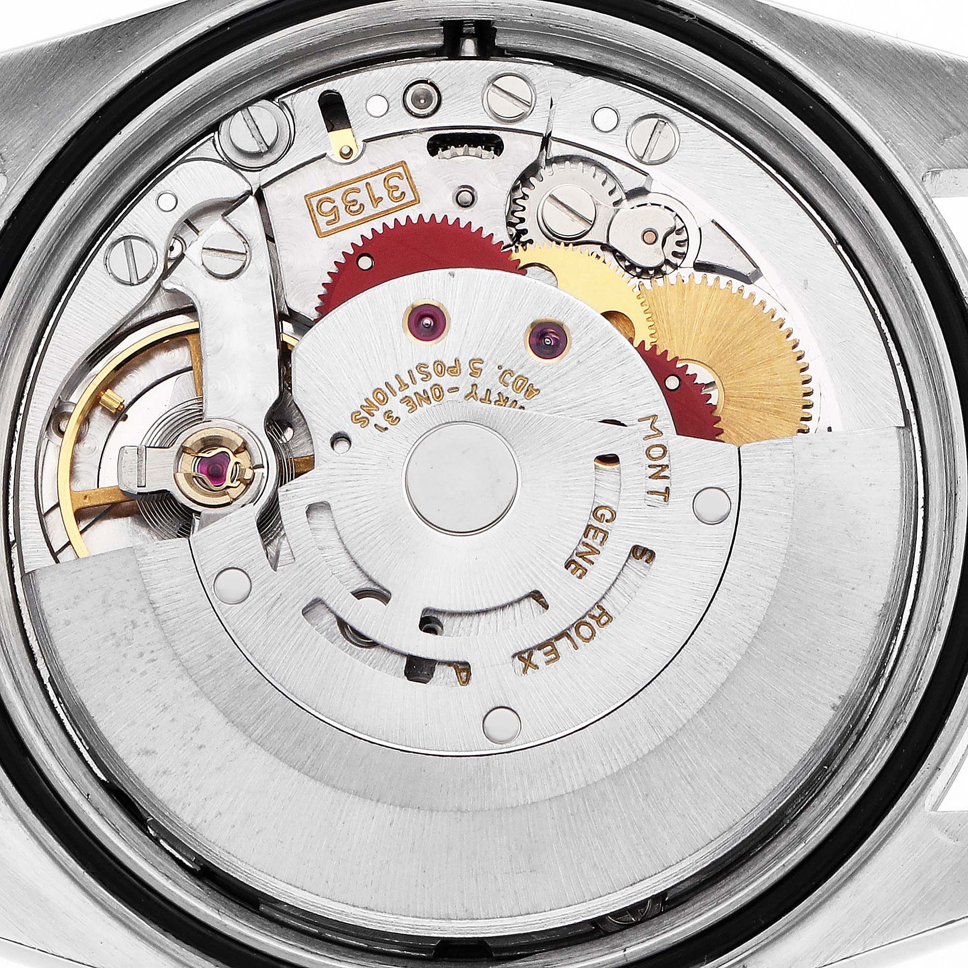 The image shows the movement of a Rolex Datejust 16233 Men's Steel and Gold (two tone) Beige Dial watch from a rear angle, highlighting its gears and intricate mechanics.
