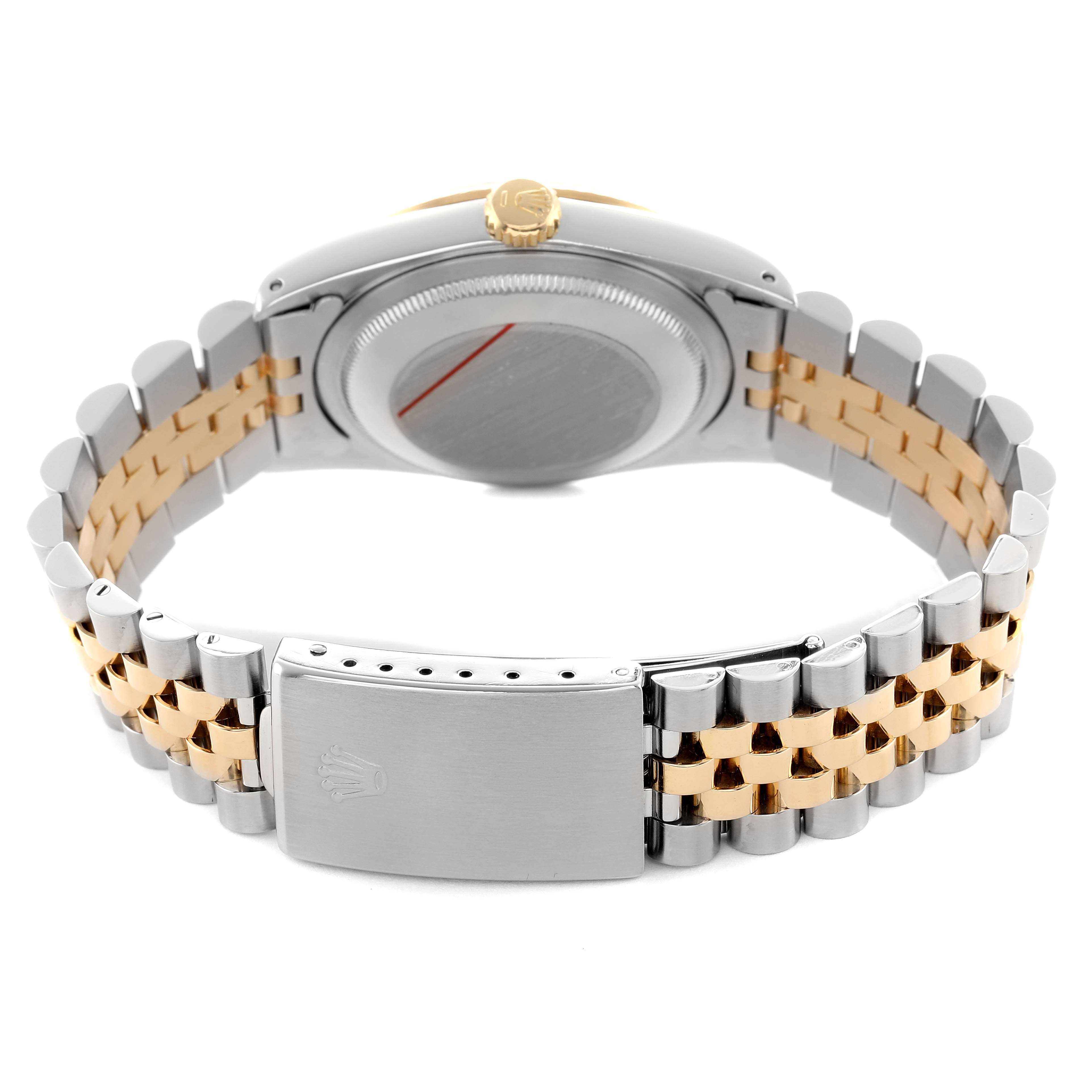 The Rolex Datejust 16233 Men's Steel and Gold (two tone) Beige Dial watch is shown from the back, highlighting the clasp, case back, and two-tone bracelet.