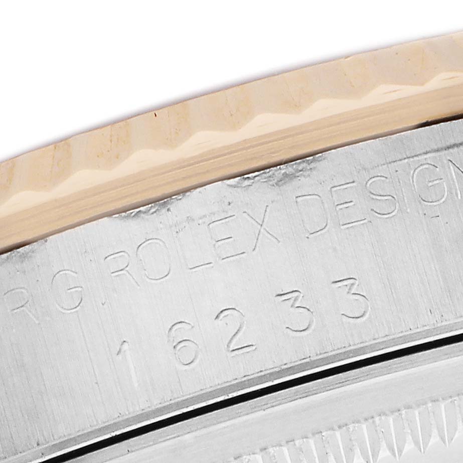 The image shows a close-up of the side of a Rolex Datejust 16233 Men's Steel and Gold (two tone) Beige Dial watch, highlighting the model number engraving.