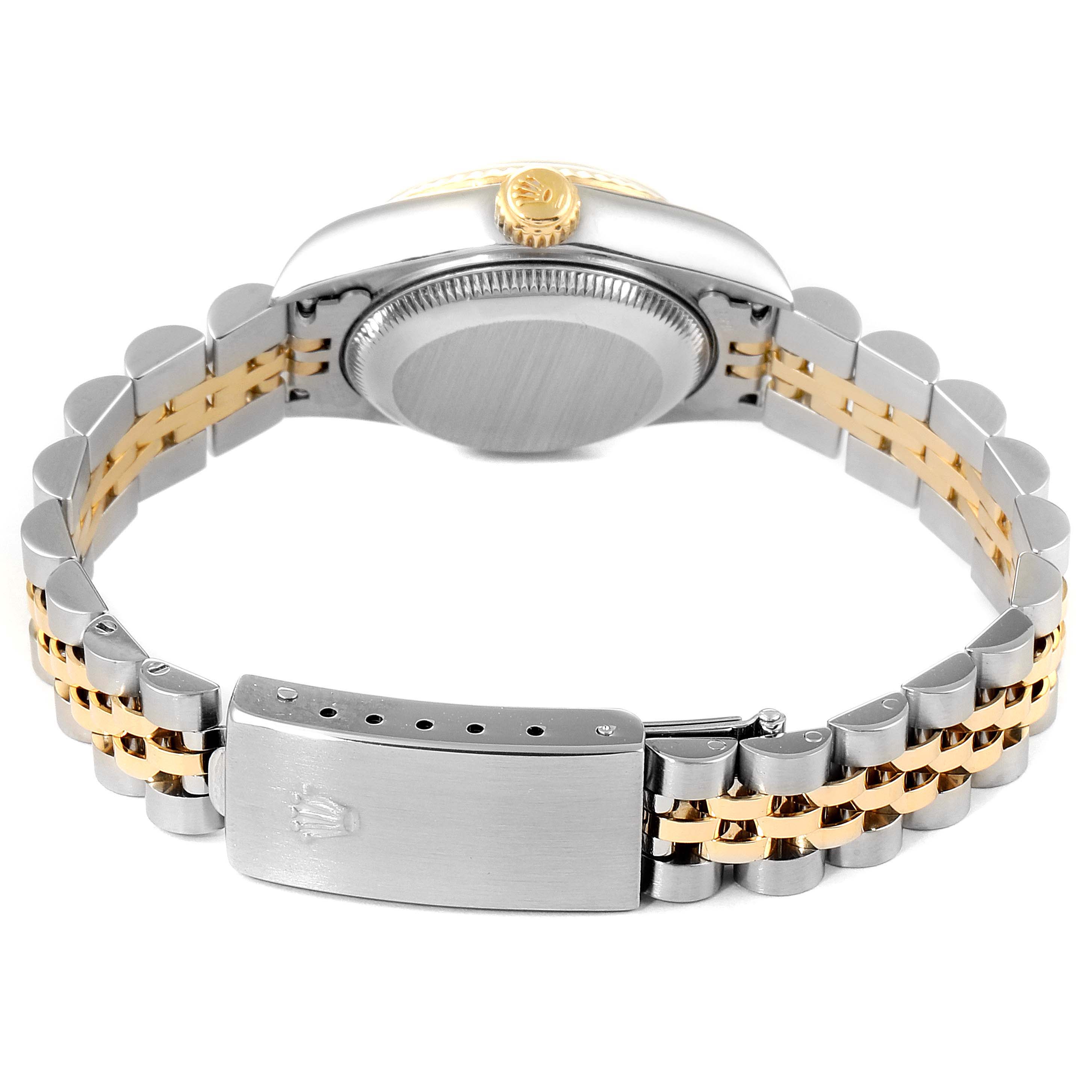 This image shows the back view of a Rolex Datejust 79173 Women's Steel and Gold (two tone) White Dial 79173 Women's Steel and Gold (two tone) White Dial, featuring the clasp, bracelet, crown, and case back.