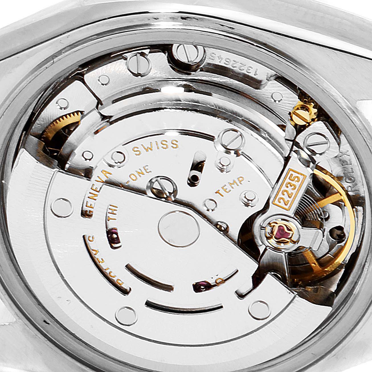 The image shows a close-up of the Rolex Datejust 79173 Women's Steel and Gold (two tone) White Dial 79173 Women's Steel and Gold (two tone) White Dial's movement and inner mechanics from the back.