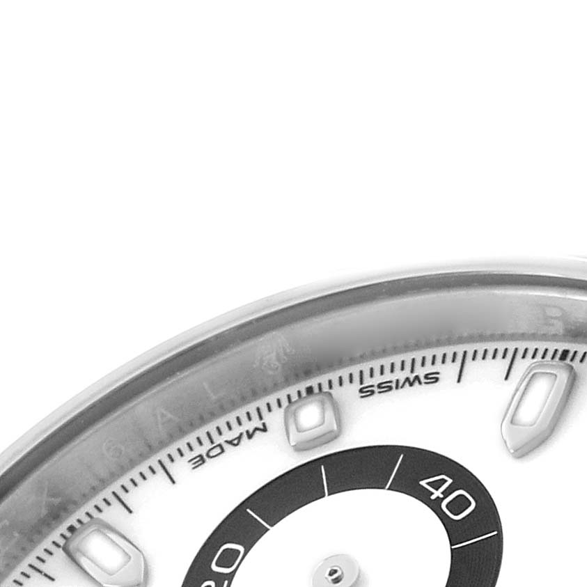 The image shows a close-up of the dial and bezel of a Rolex Daytona 116500 Men's Stainless Steel White Dial watch.