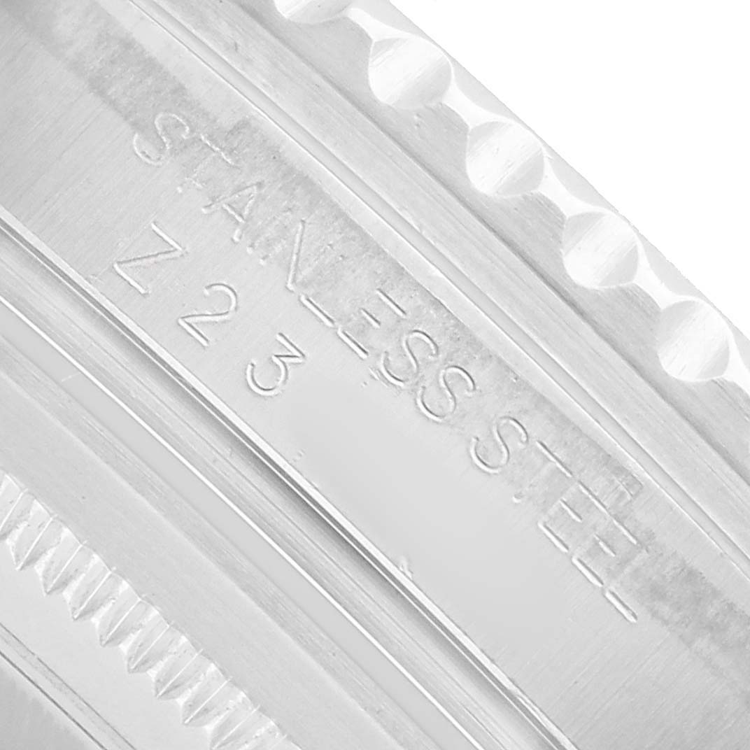 The image shows a close-up of the case side and bezel of a Rolex GMT-Master 16710 Men's Stainless Steel Black Dial, highlighting the stainless steel marking.