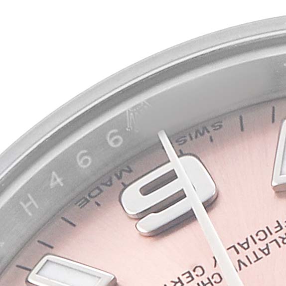 The image shows a close-up of the dial of a Rolex Oyster Perpetual 176200 Women's Stainless Steel Pink Dial, focusing on the 9 o'clock marker and adjacent details.
