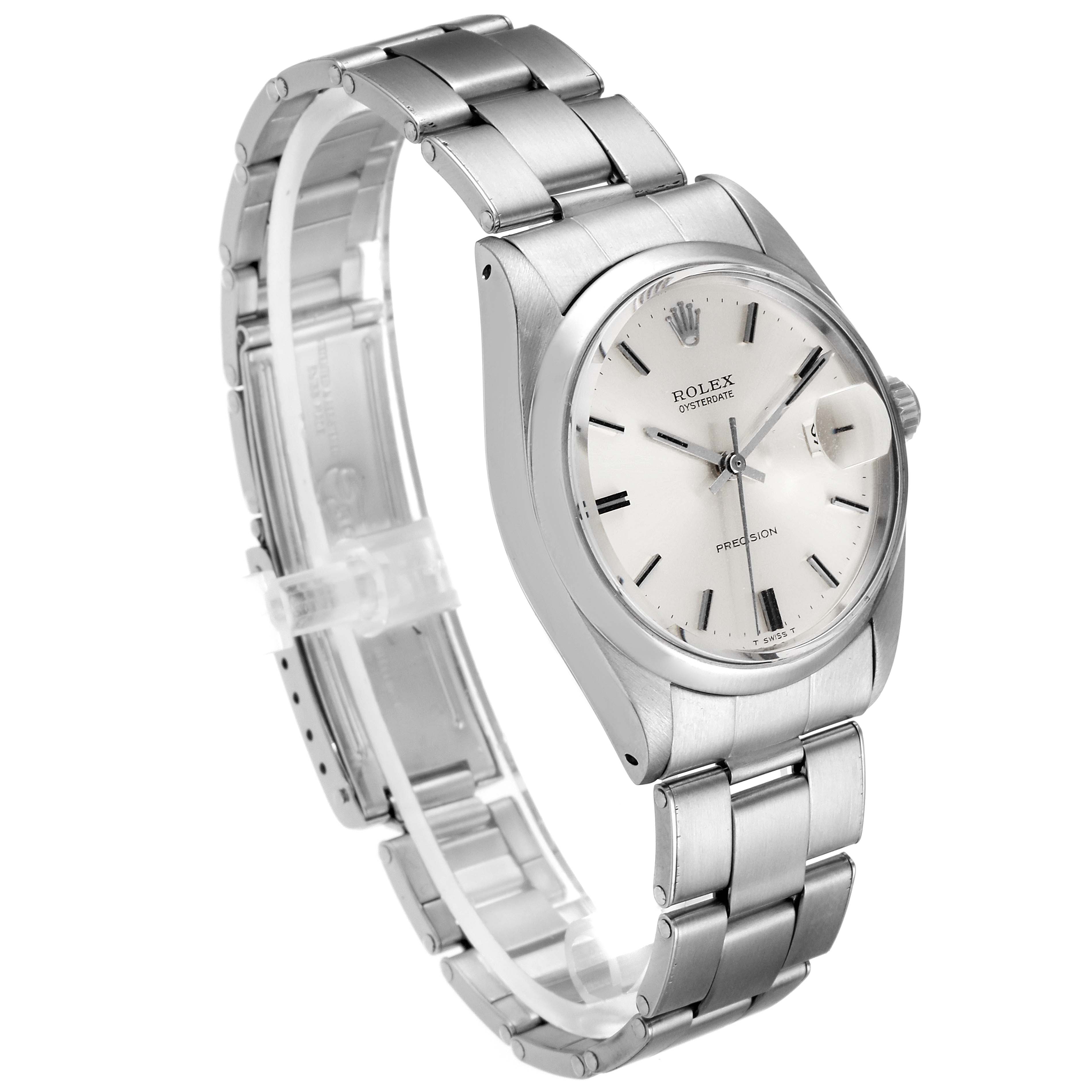 The Vintage Collection Rolex watch is shown from an angled side view, displaying the full bracelet and face.