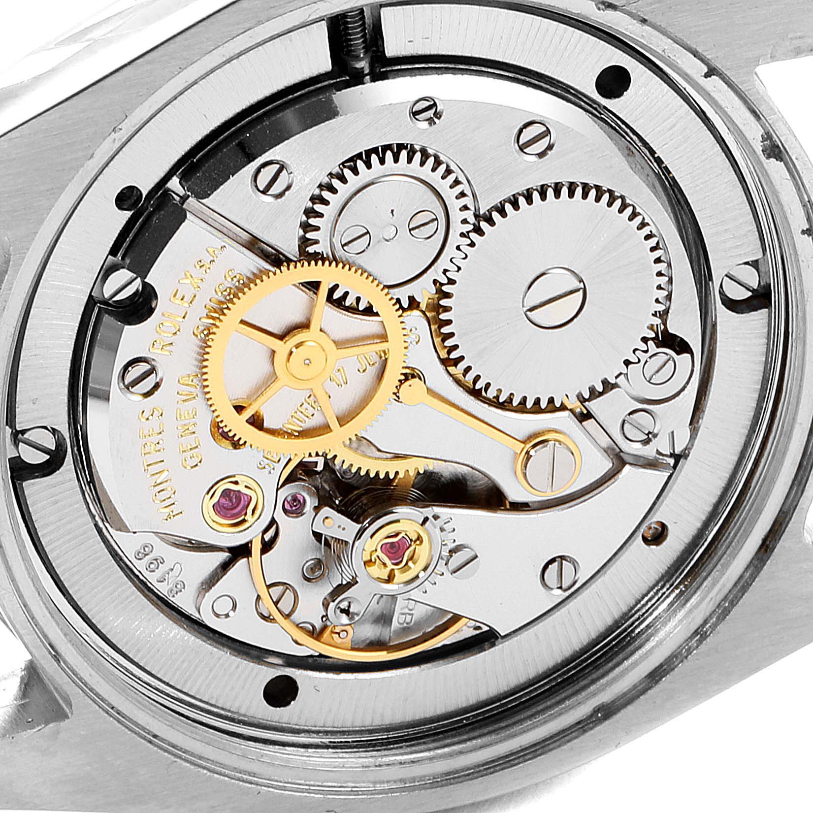 The image shows the inner mechanics and gears of the Rolex Vintage Collection 6694 Men
s Stainless Steel Silver Dial 6694 Men
s Stainless Steel Silver Dial model from a close-up, top-down angle.