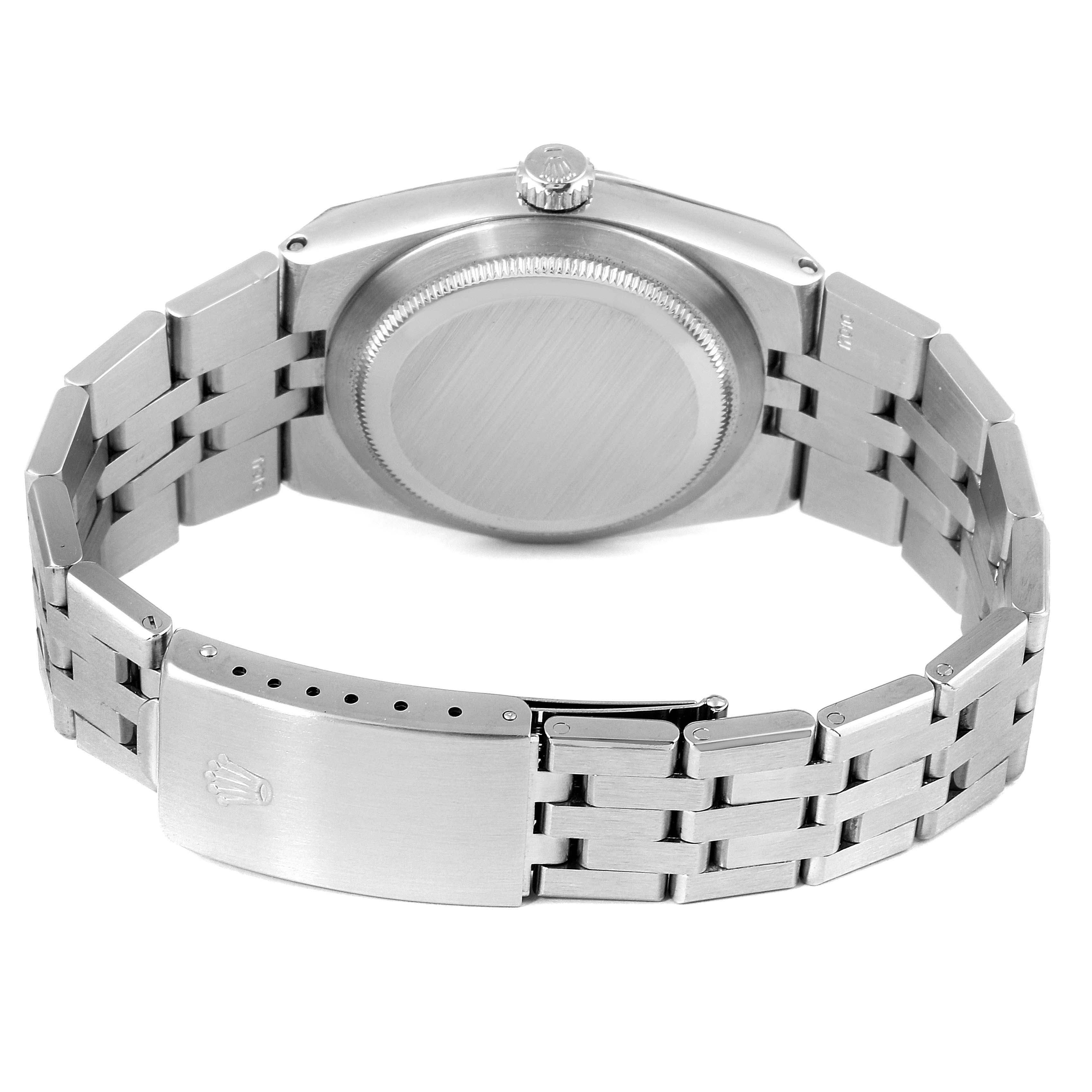 This image shows the back view of the Rolex Oysterquartz 19601 Men's Stainless Steel Silver Dial 19601 Men's Stainless Steel Silver Dial watch, highlighting the case back, crown, and bracelet.