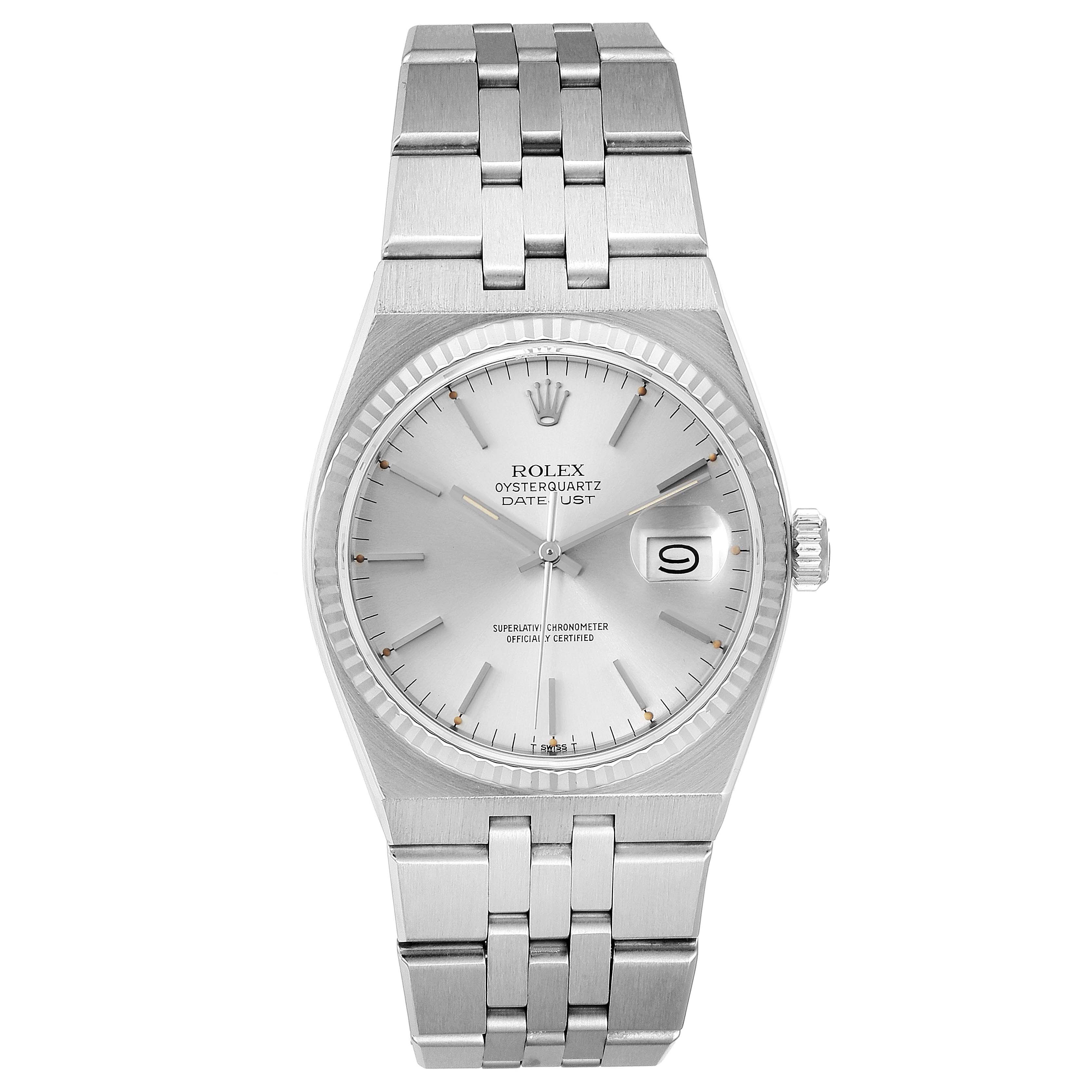 The image shows a top-down view of a Rolex Oysterquartz 19601 Men's Stainless Steel Silver Dial 19601 Men's Stainless Steel Silver Dial watch, highlighting the silver dial, bracelet, and date display.