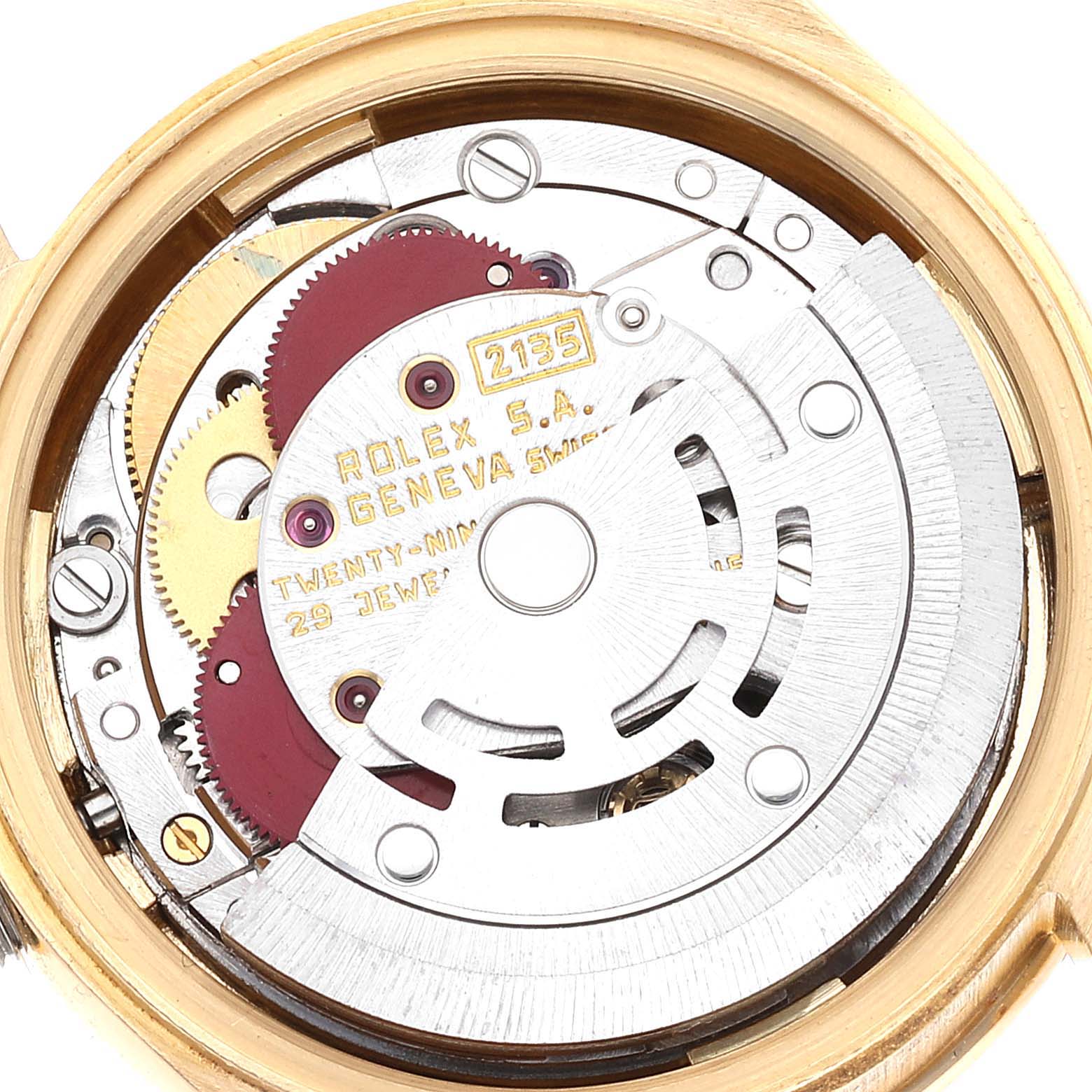 This is a close-up view of the inner mechanical movement of a Rolex President 69158 Women's Yellow Gold Champagne Dial 69158 Women's Yellow Gold Champagne Dial model watch.