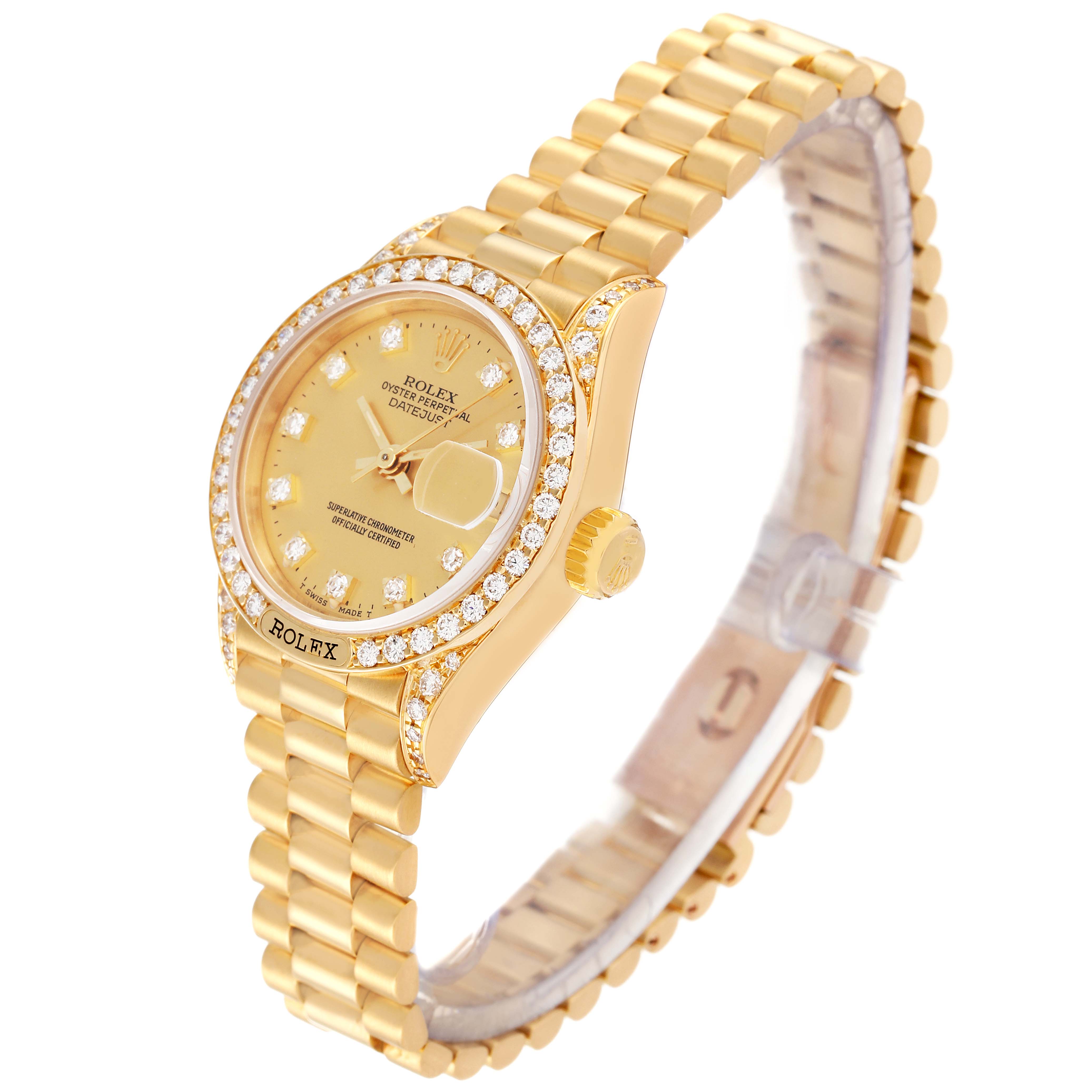 The Rolex President 69158 Women's Yellow Gold Champagne Dial 69158 Women's Yellow Gold Champagne Dial model watch is shown at a slight angle, displaying its gold band, diamond-studded bezel, and dial.