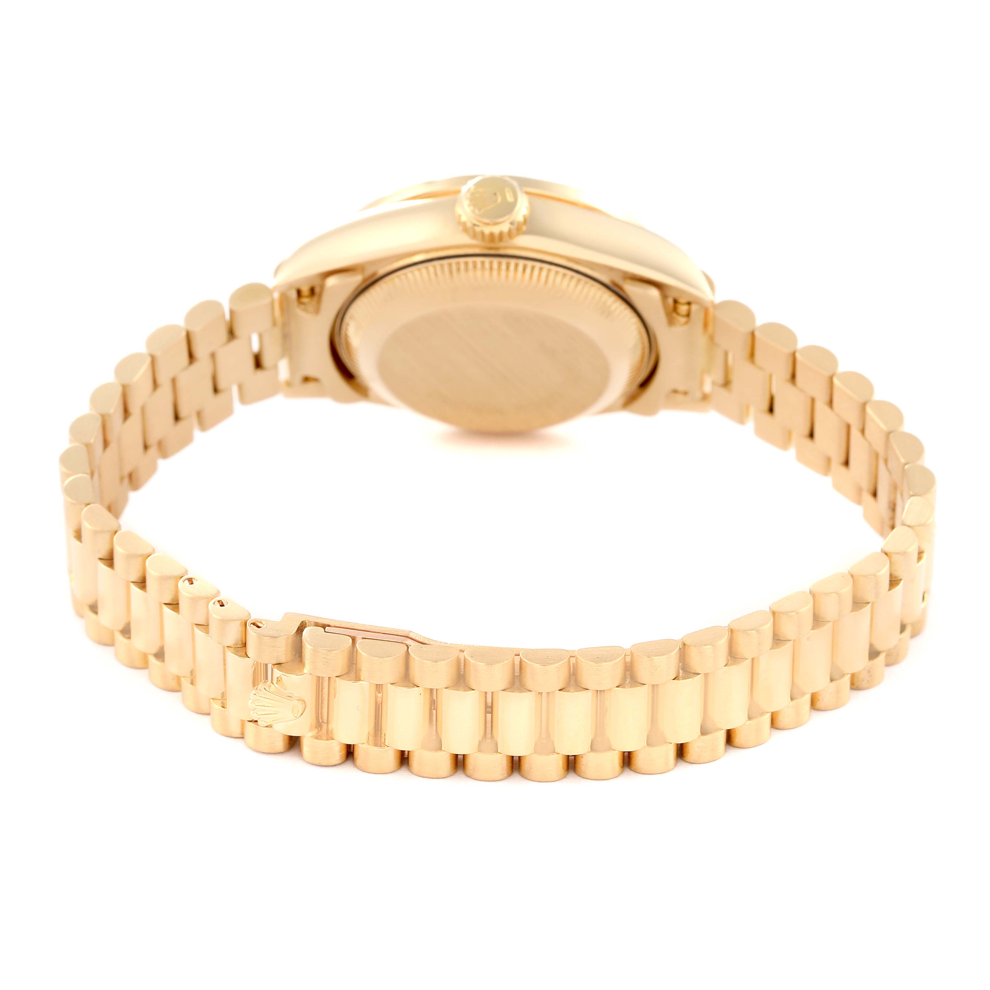 The image shows the back view of a President model Rolex watch, highlighting its case back, crown, and bracelet.