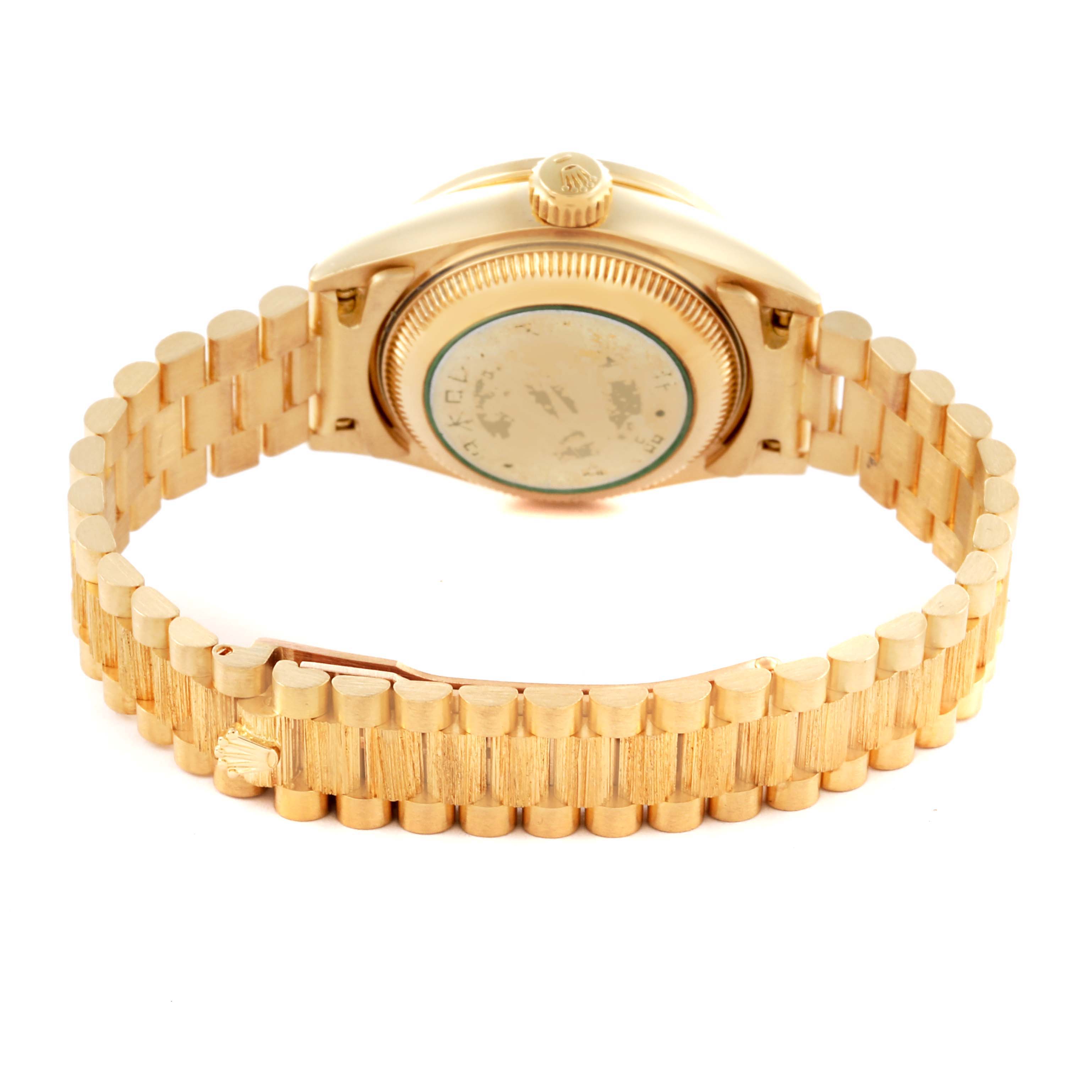 The image shows the back and bracelet of a Rolex President 69288 Women's Yellow Gold White Dial 69288 Women's Yellow Gold White Dial watch, highlighting its gold links and clasp.