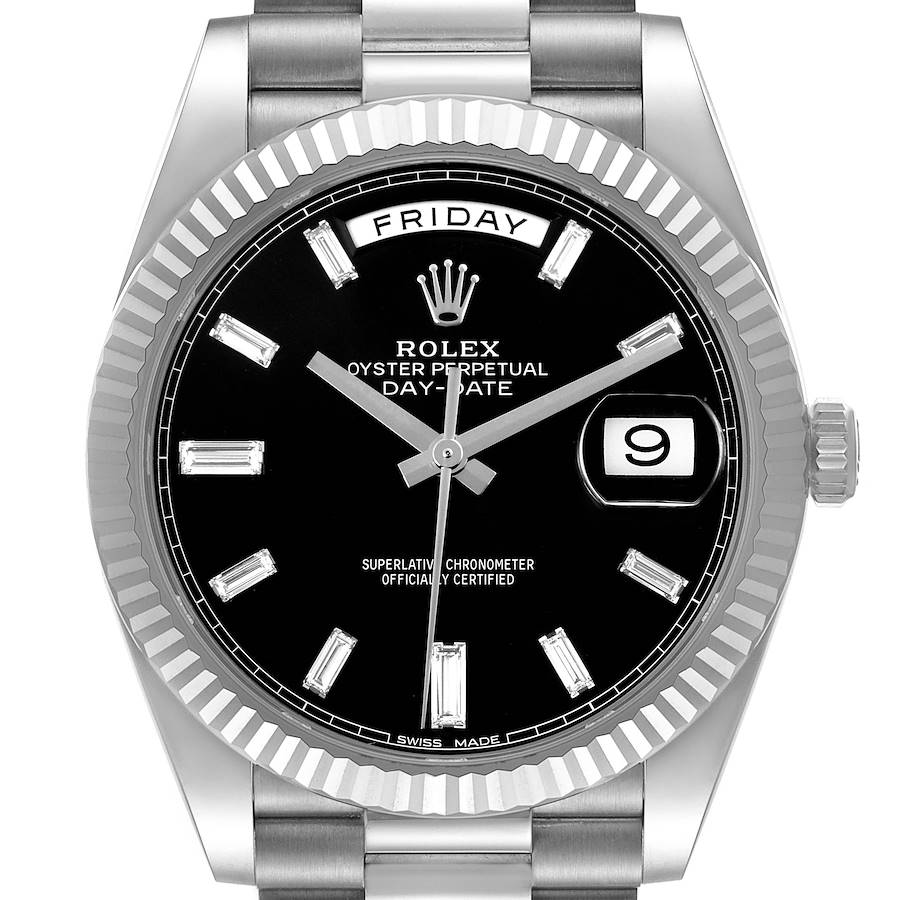 The image shows a frontal view of the Rolex President watch, highlighting its black dial, fluted bezel, and day-date displays.