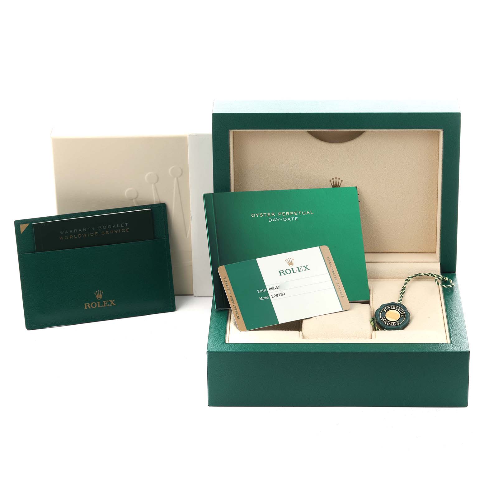 The image shows the Rolex President 228239 Men's White Gold Black Dial 228239 Men's White Gold Black Dial model box, warranty booklets, certificates, and a tag, all from a frontal angle.