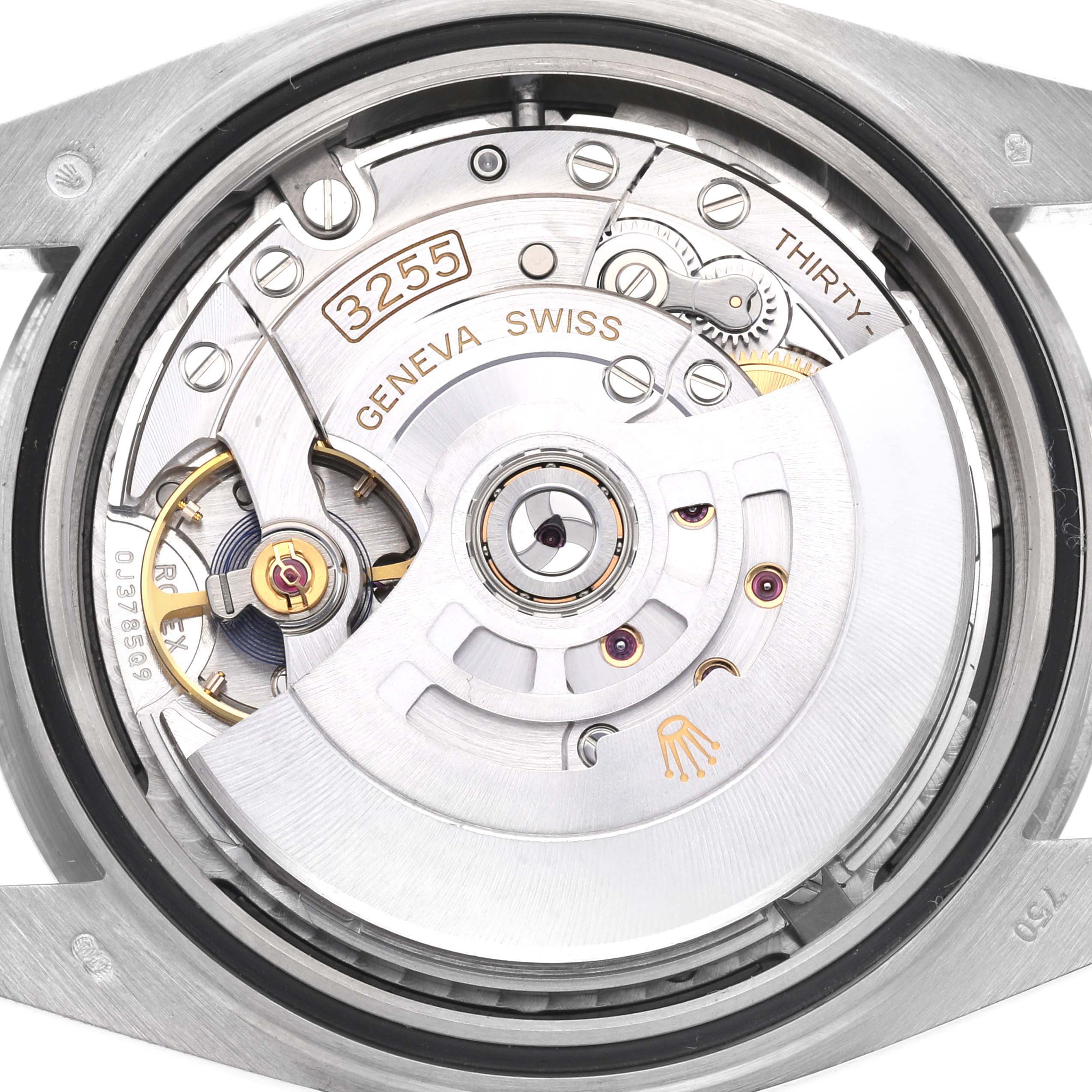 This image shows the movement from the back of a Rolex President 228239 Men's White Gold Black Dial 228239 Men's White Gold Black Dial watch, highlighting the intricate mechanical parts.