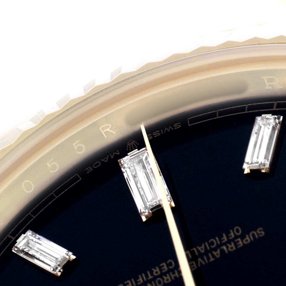 The close-up shows the dial and indices of the Rolex President 228238 Men's Yellow Gold Black Dial model watch.