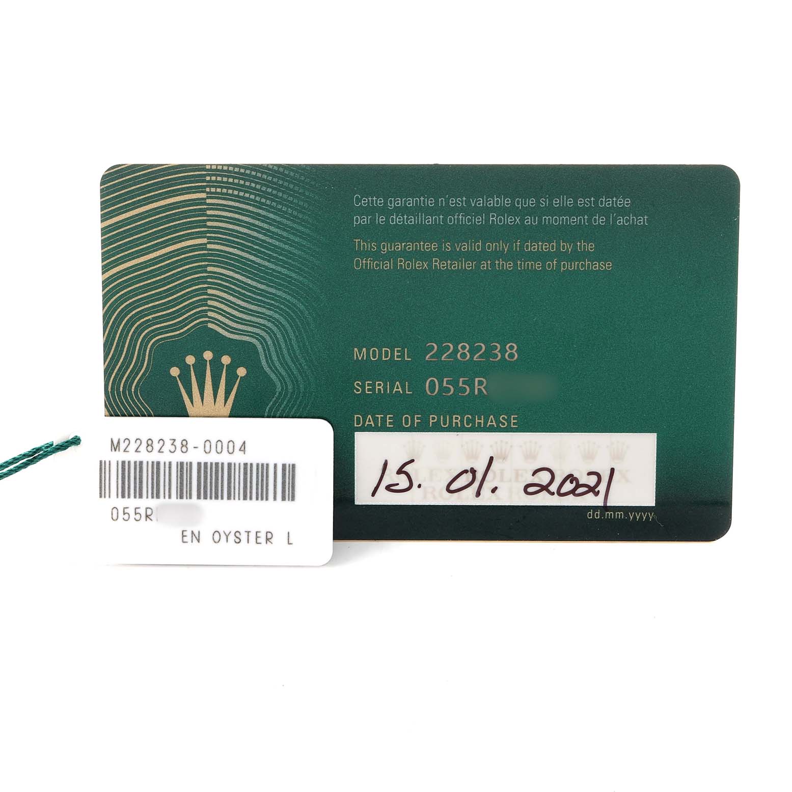The image shows a warranty card and tag for the Rolex President 228238 Men's Yellow Gold Black Dial model.