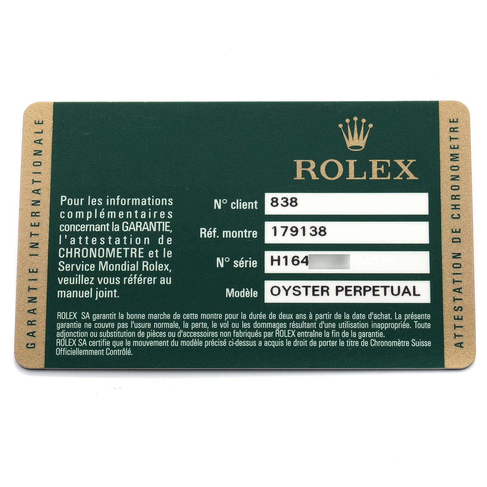 This image shows a Rolex warranty card for an Oyster Perpetual model, highlighting client, watch, series numbers, and other details.