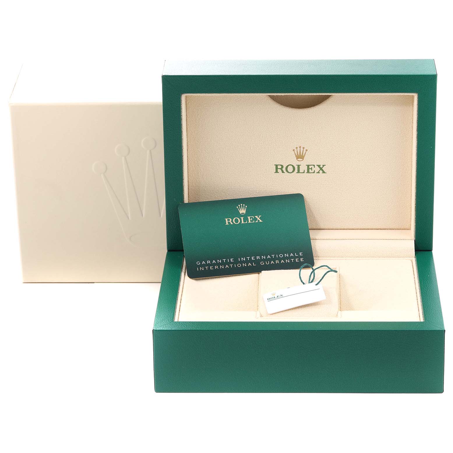 The image shows the open box and international guarantee card for a Rolex Submariner 126613LN Men
s Steel and Gold (two tone) Black Dial 126613LN Men
s Steel and Gold (two tone) Black Dial watch.