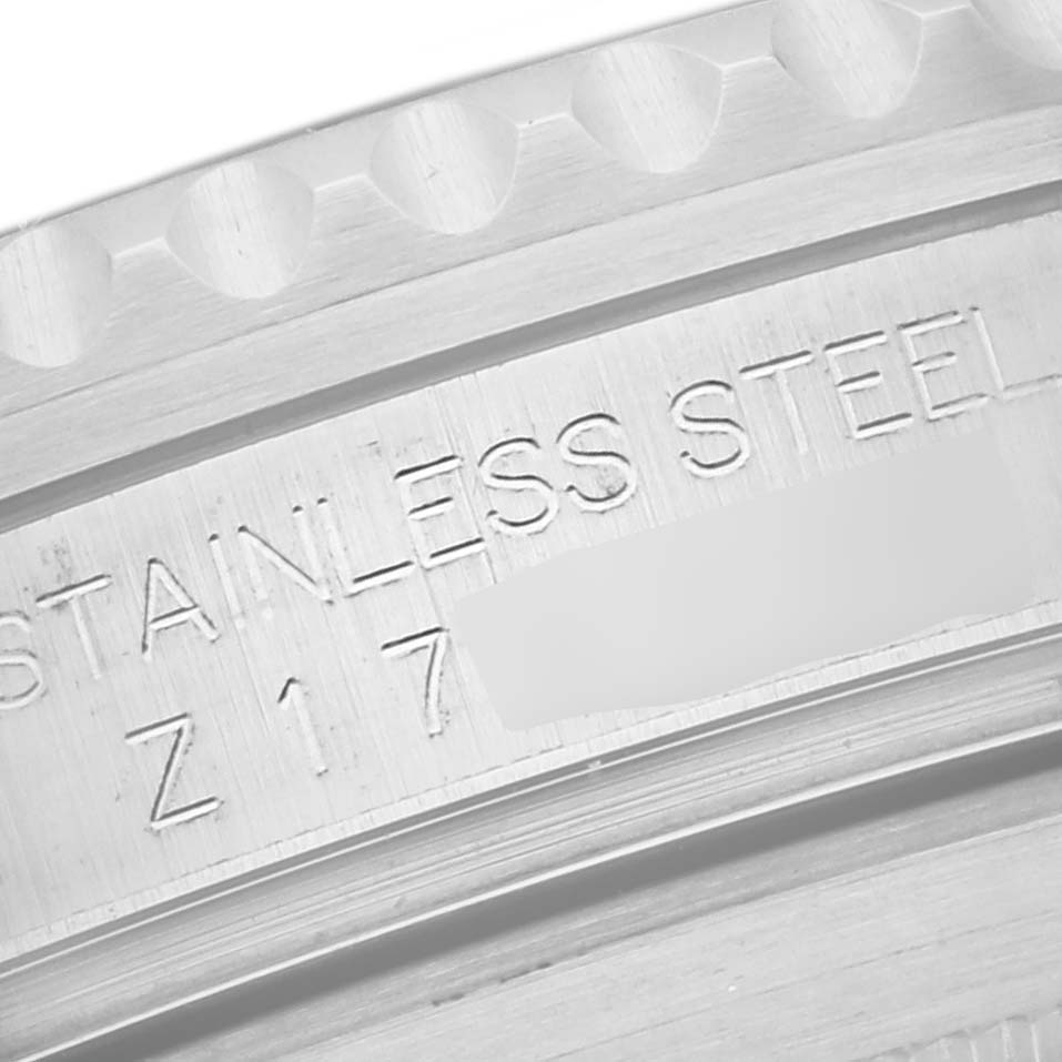 The image shows a close-up of the stainless steel engraving on the Rolex Submariner 16610 T Men's Stainless Steel Black Dial 16610 T Men's Stainless Steel Black Dial's case back.