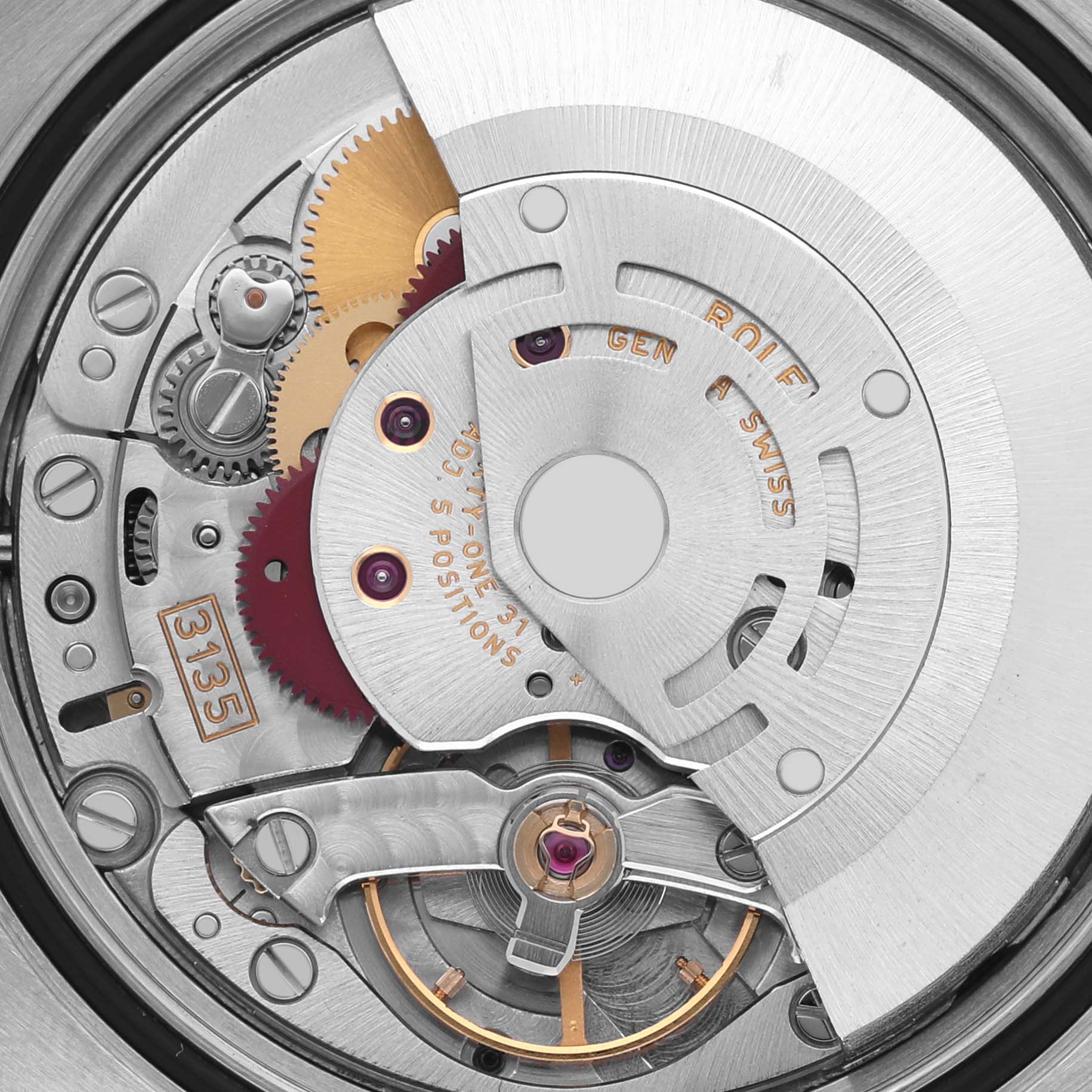 The image shows a close-up of the Rolex Turn-o-Graph 116263 Men's Steel and Gold (two tone) Grey Dial 116263 Men's Steel and Gold (two tone) Grey Dial's movement, highlighting gears and the rotor.