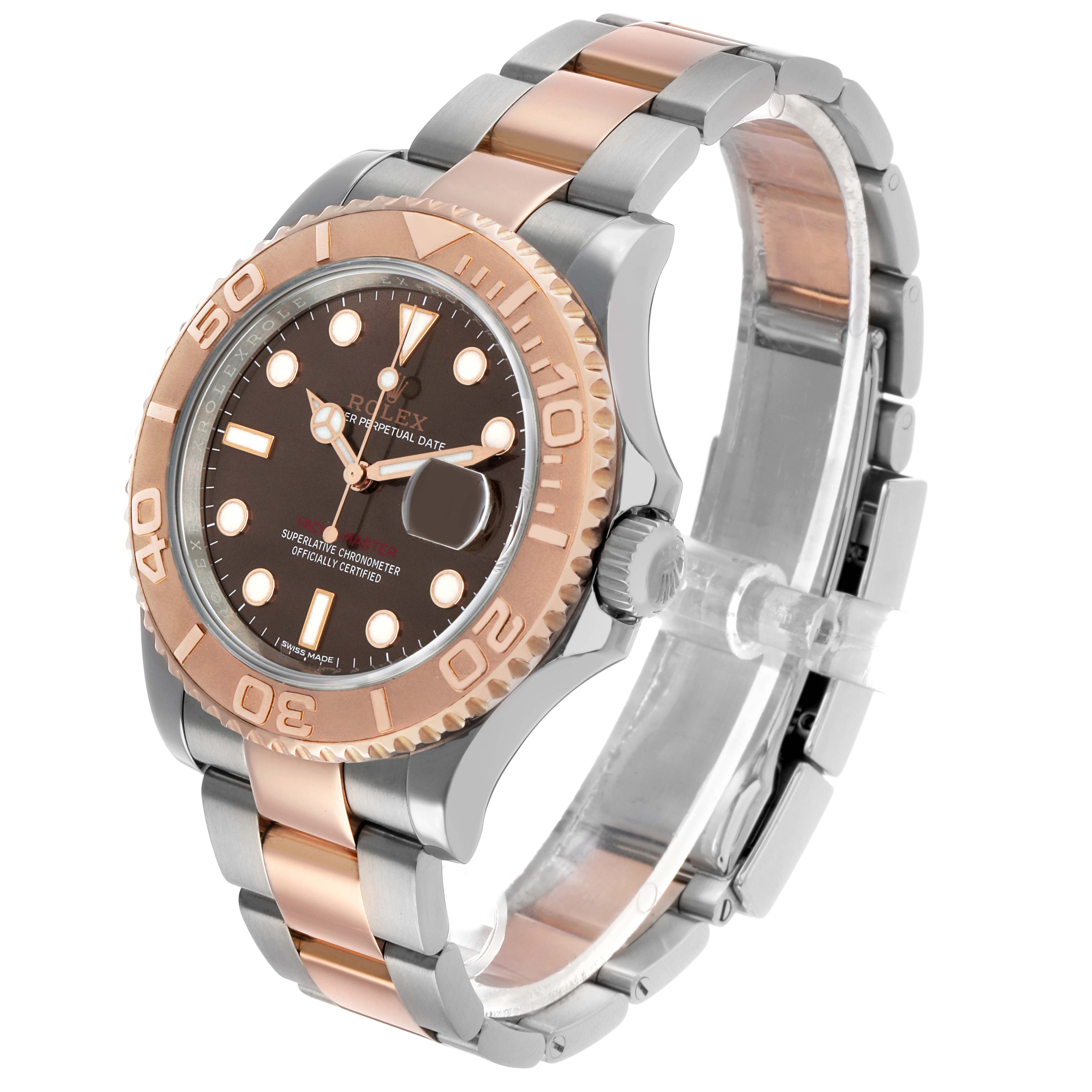 The Rolex Yacht-Master 116621 Men's Steel and Gold (two tone) Brown Dial watch is shown from a three-quarter angle, highlighting the bezel, dial, bracelet, and clasp.