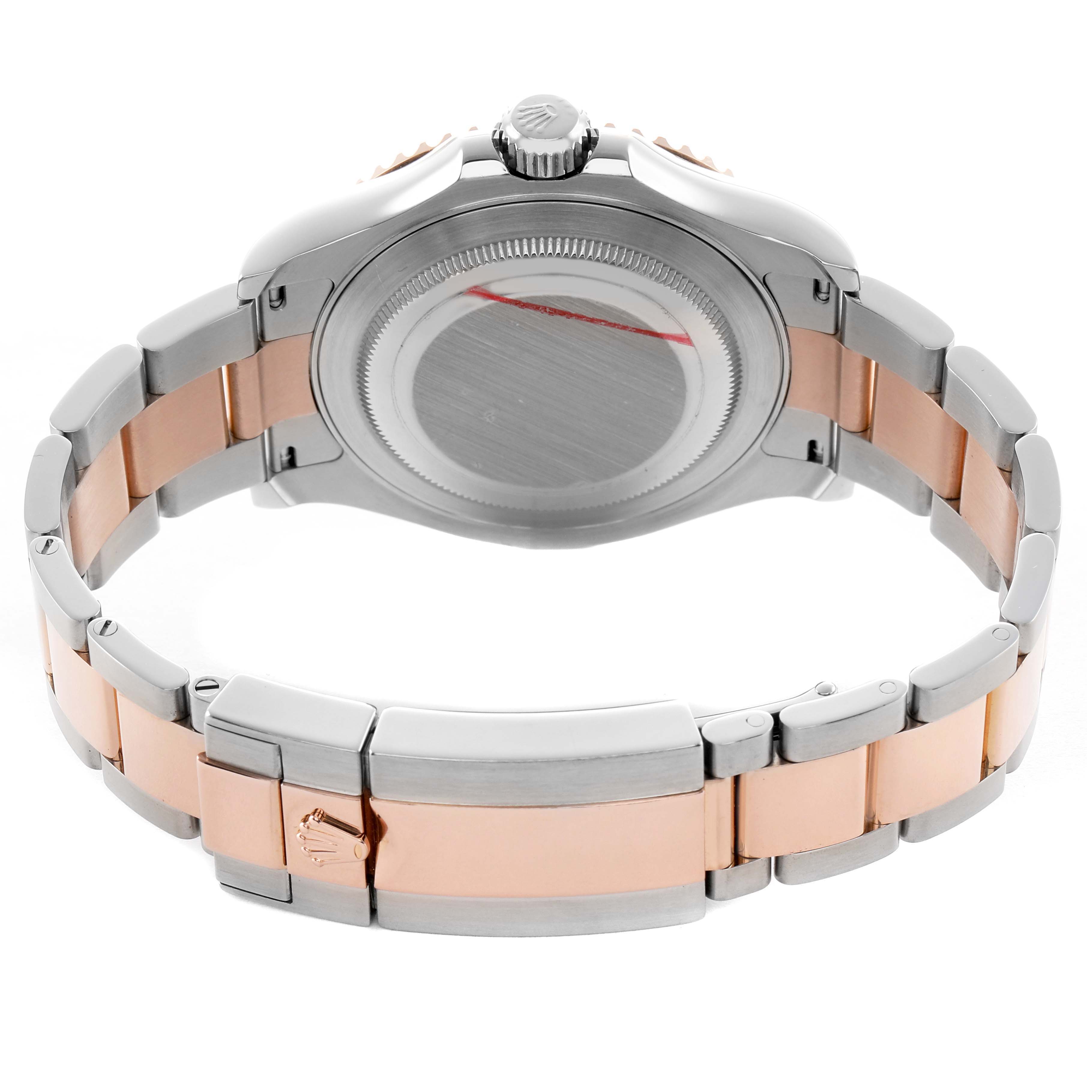 The image shows the Rolex Yacht-Master 116621 Men's Steel and Gold (two tone) Brown Dial from the back, displaying the case back, crown, and bracelet with a mixed metal design.