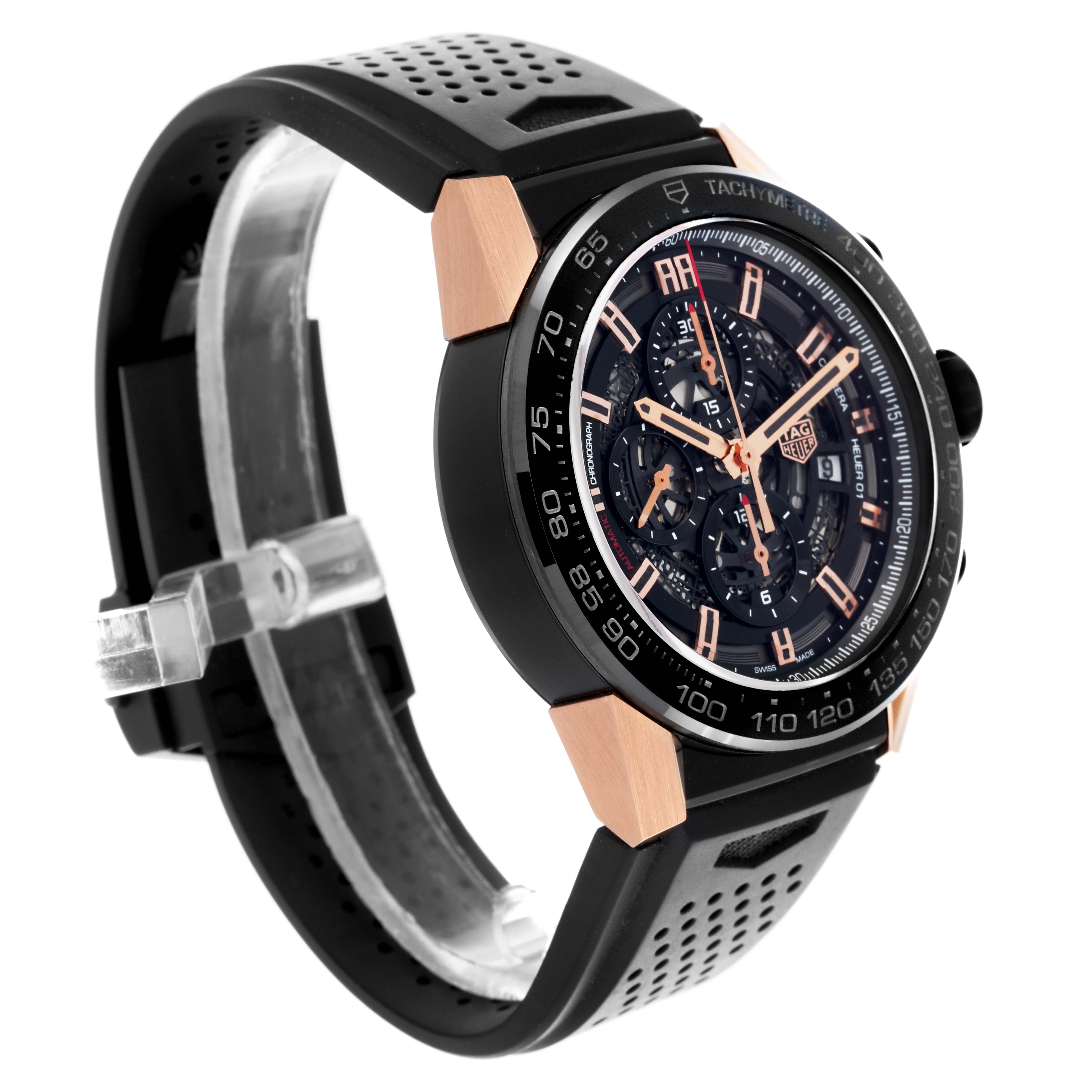 The Tag Heuer Carrera CAR2A5A Men's Titanium Transparent Dial CAR2A5A Men's Titanium Transparent Dial watch is shown at a slight angle, highlighting its black perforated strap and rose gold accents.