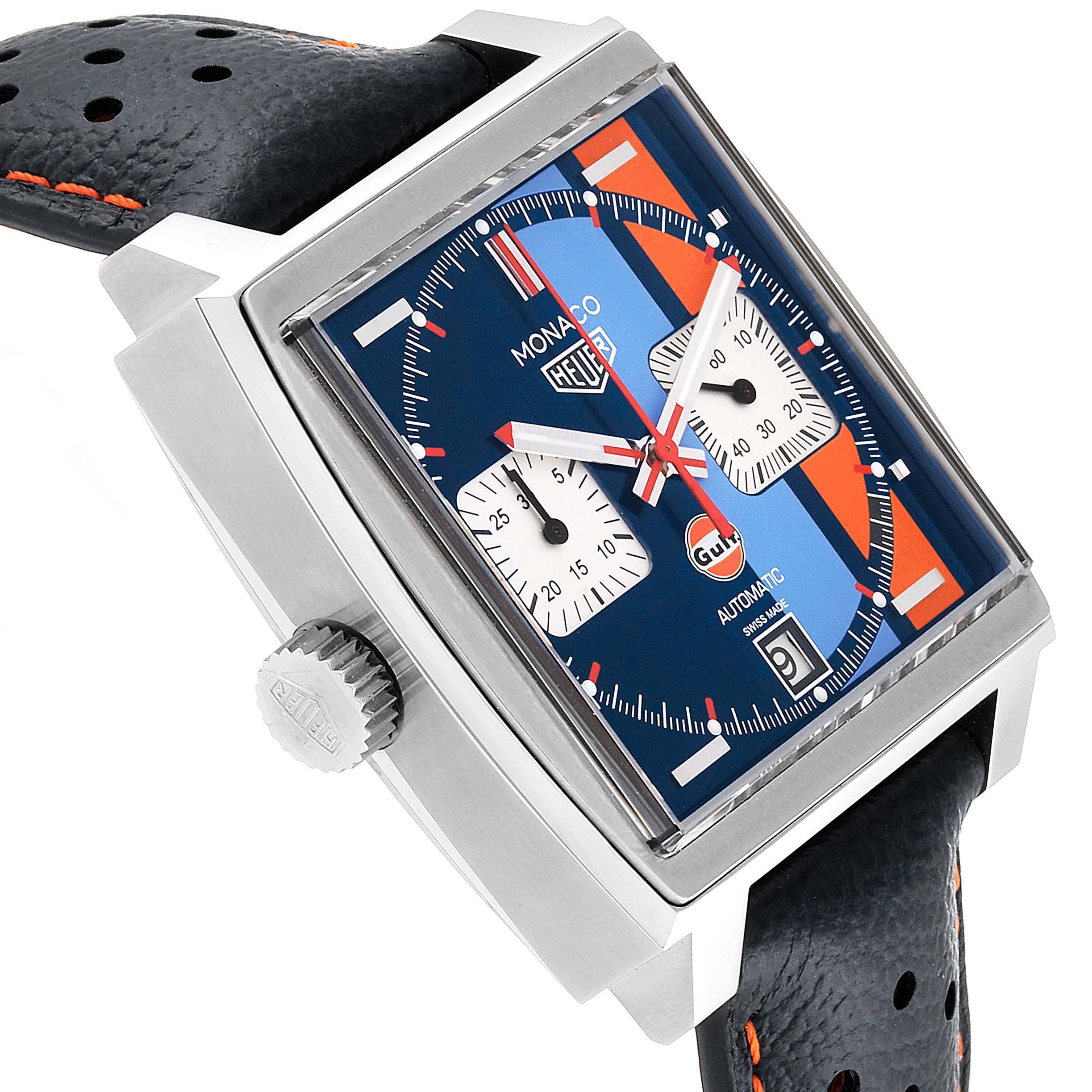 The image displays a side angle of the Tag Heuer Monaco CAW211R.FC6401 Men's Stainless Steel Blue Dial CAW211R.FC6401 Men's Stainless Steel Blue Dial watch, highlighting its square case, dial, crown, and leather strap.