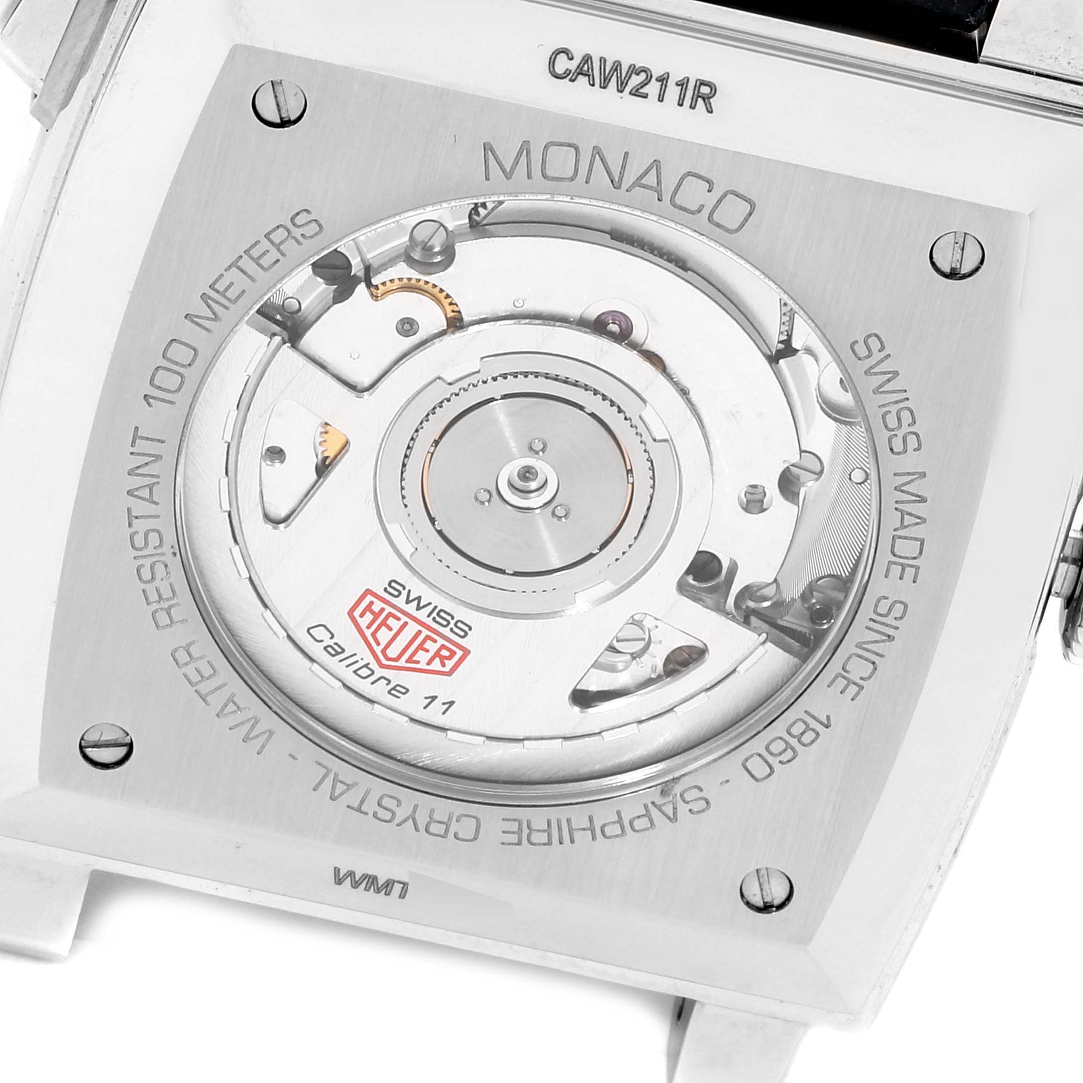 The image shows the back of a Tag Heuer Monaco CAW211R.FC6401 Men's Stainless Steel Blue Dial CAW211R.FC6401 Men's Stainless Steel Blue Dial watch, specifically highlighting the movement and various engravings.