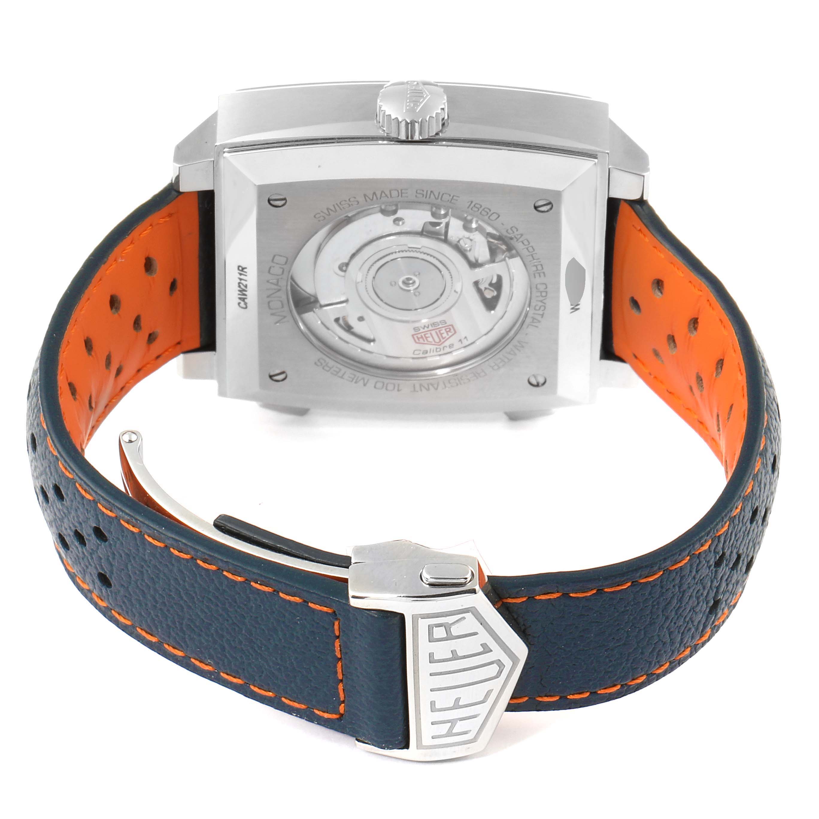 This image shows the back view of a Tag Heuer Monaco CAW211R.FC6401 Men's Stainless Steel Blue Dial CAW211R.FC6401 Men's Stainless Steel Blue Dial watch with its strap and clasp visible.