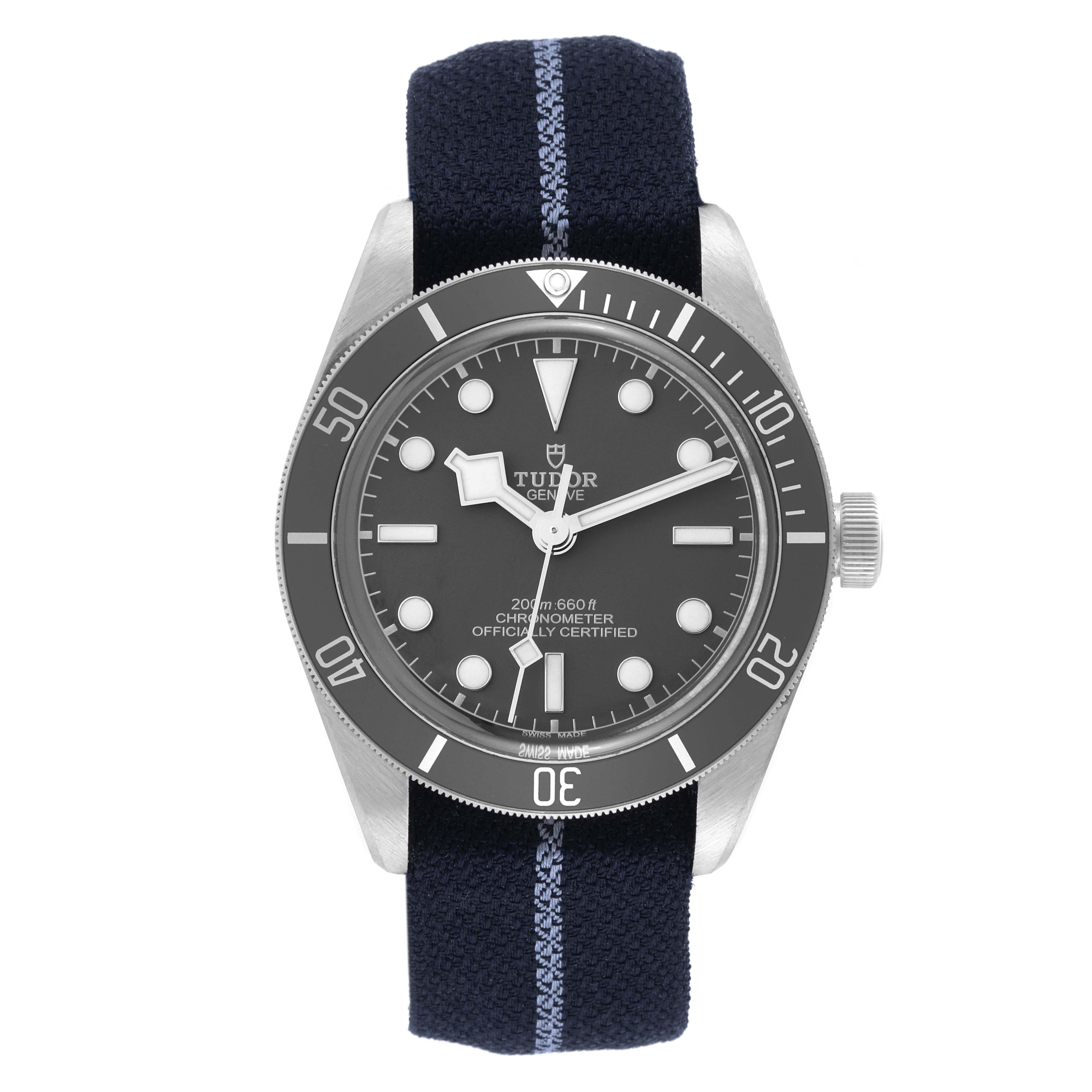 This image shows the front view of a Tudor Heritage Black Bay 79010SG Men
s Stainless Steel Grey Dial 79010SG Men
s Stainless Steel Grey Dial watch, highlighting its face, bezel, hands, and fabric strap.