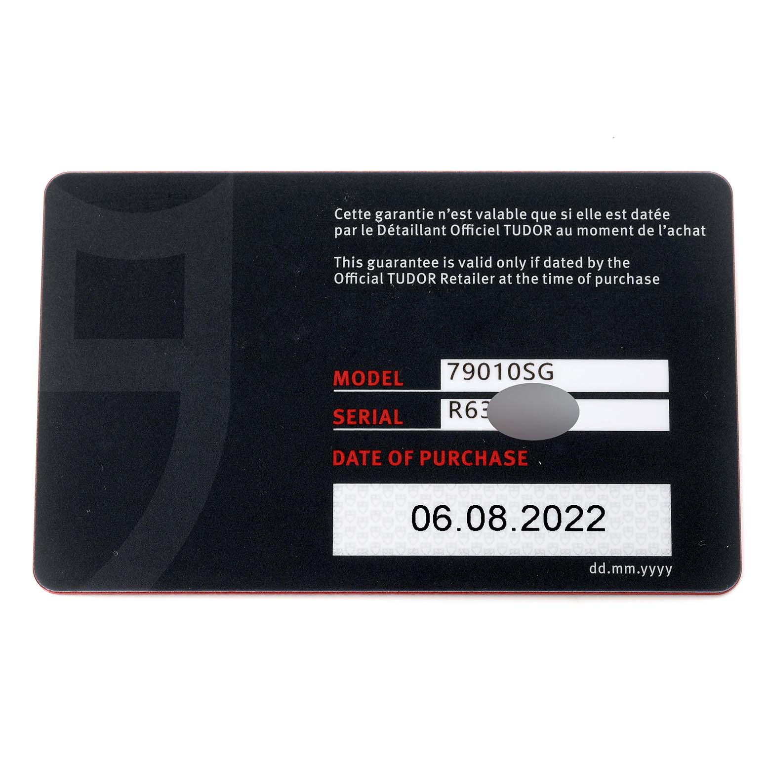 This image shows a warranty card for a Tudor Heritage Black Bay 79010SG Men
s Stainless Steel Grey Dial 79010SG Men
s Stainless Steel Grey Dial model 79010SG watch.
