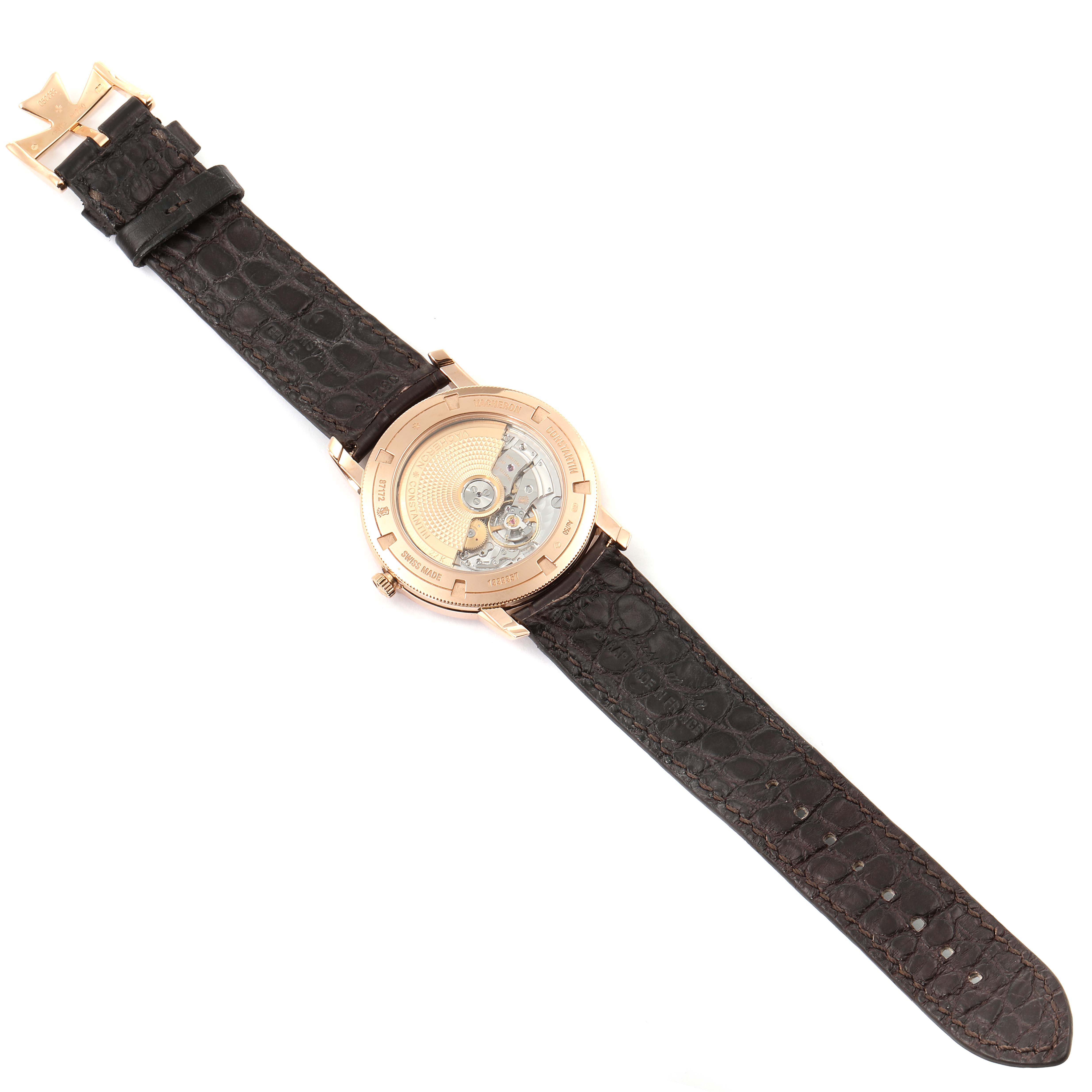 The image shows the back view of the Vacheron Constantin Traditionnelle 87172/000R-9302 Men
s Rose Gold Silver Dial 87172/000R-9302 Men
s Rose Gold Silver Dial watch, highlighting its movement and leather strap.