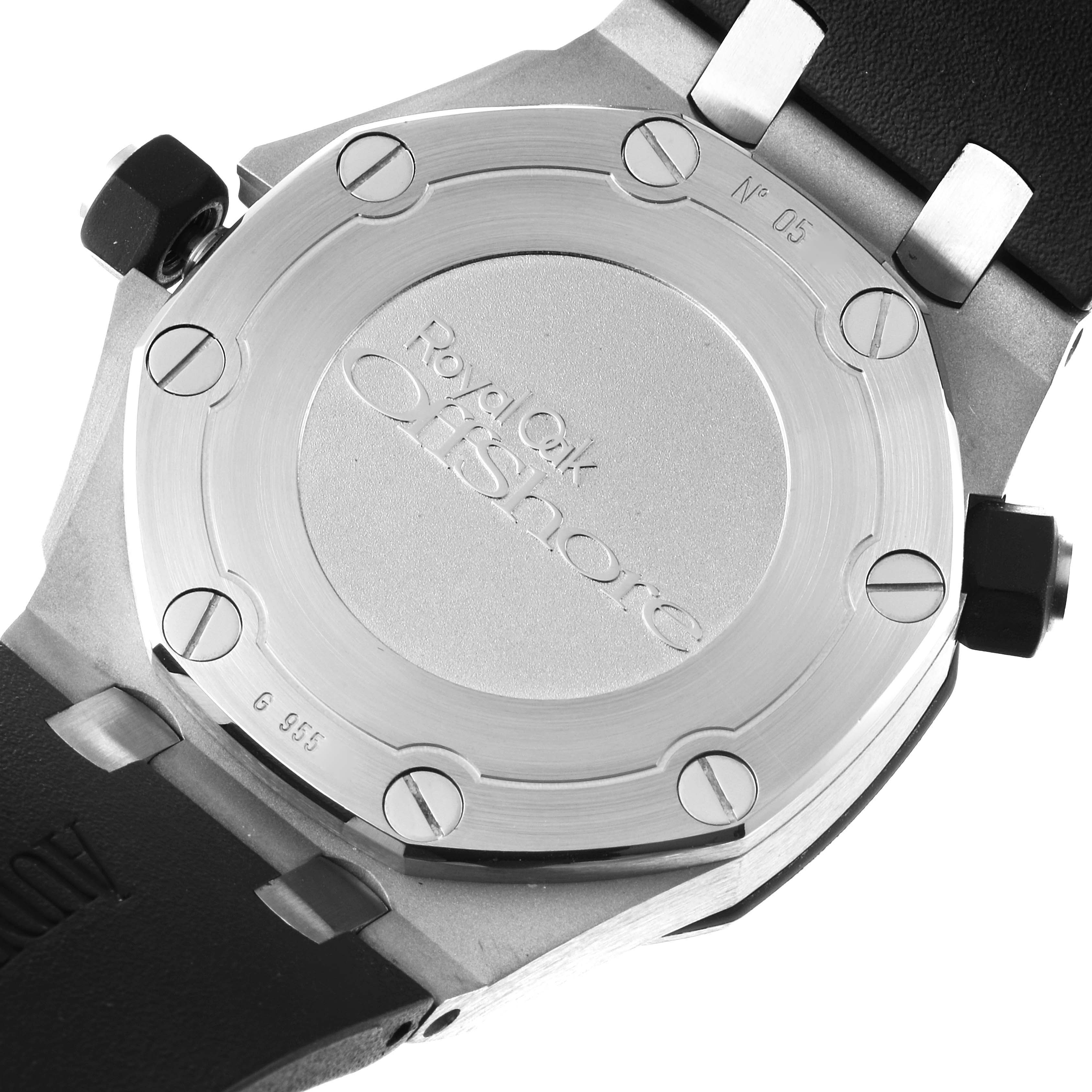 The image shows the case back of the Audemars Piguet Royal Oak Offshore 15703ST.OO.A002CA.01 Men's Stainless Steel Black Dial 15703ST.OO.A002CA.01 Men's Stainless Steel Black Dial watch, with visible screws and engraved branding.