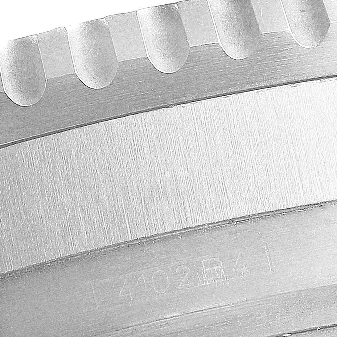 This image shows a close-up of the bezel and case side of a Breitling Navitimer A41322 Men's Stainless Steel Silver Dial A41322 Men's Stainless Steel Silver Dial watch.