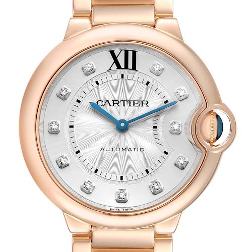 The Cartier Ballon Bleu WE902026 Women's Rose Gold Silver Dial watch is shown from a front angle, highlighting the dial, hour markers, and crown.