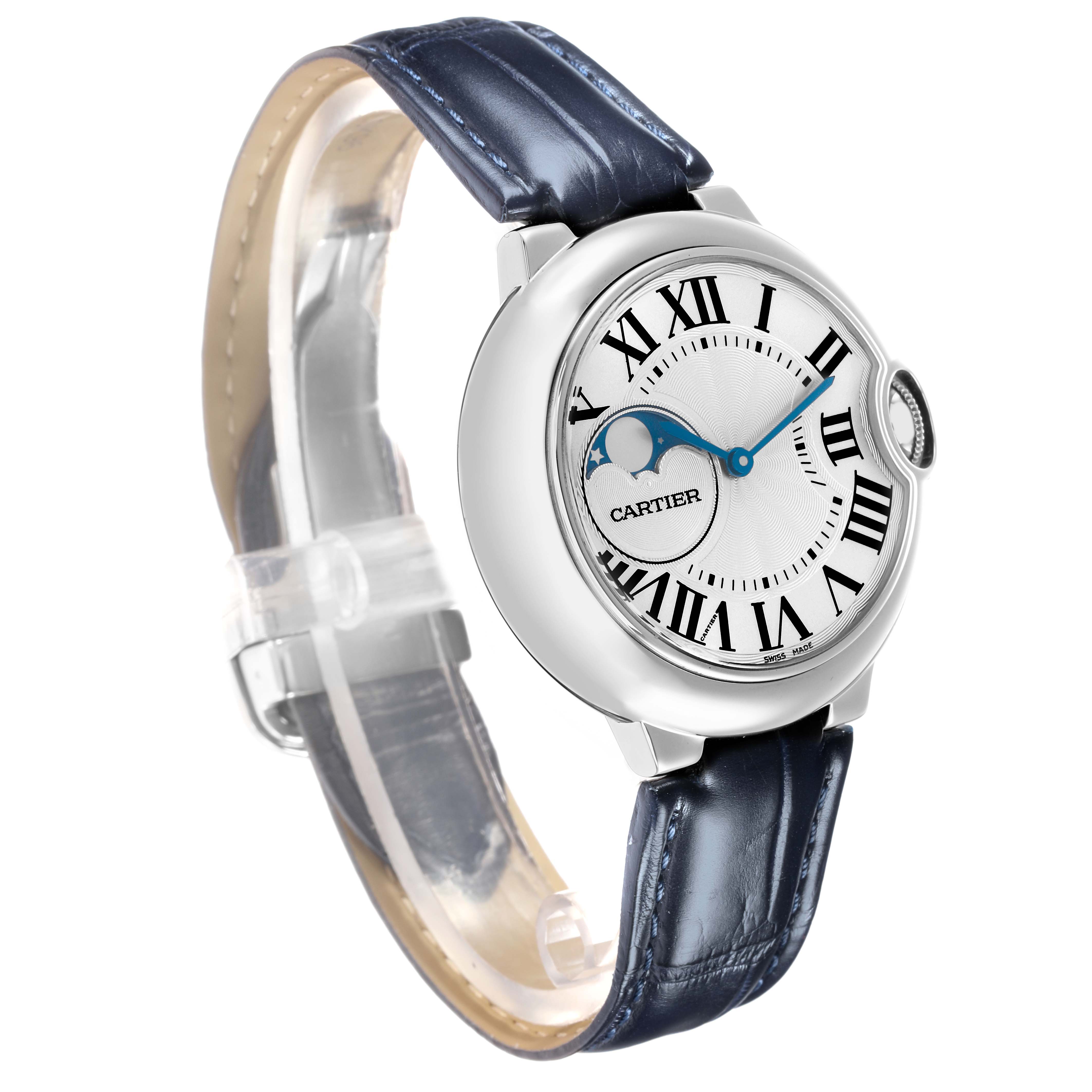 The Cartier Ballon Bleu WSBB0020 Men
s Stainless Steel Silver Dial watch is shown at a front-left angle, highlighting its dial, case, and blue leather strap.
