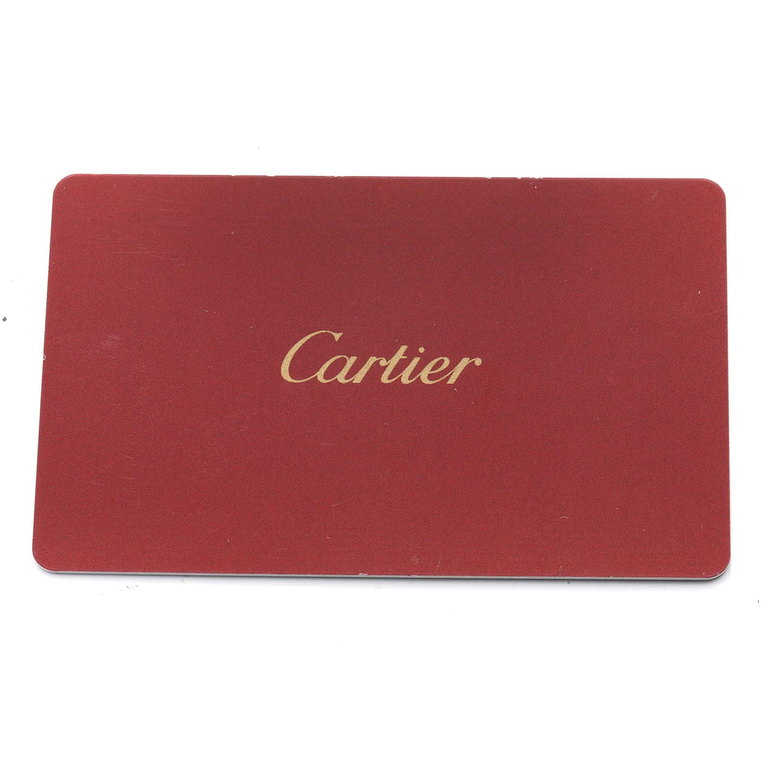 The image shows a red Cartier certificate card, likely for the Ballon Bleu watch.
