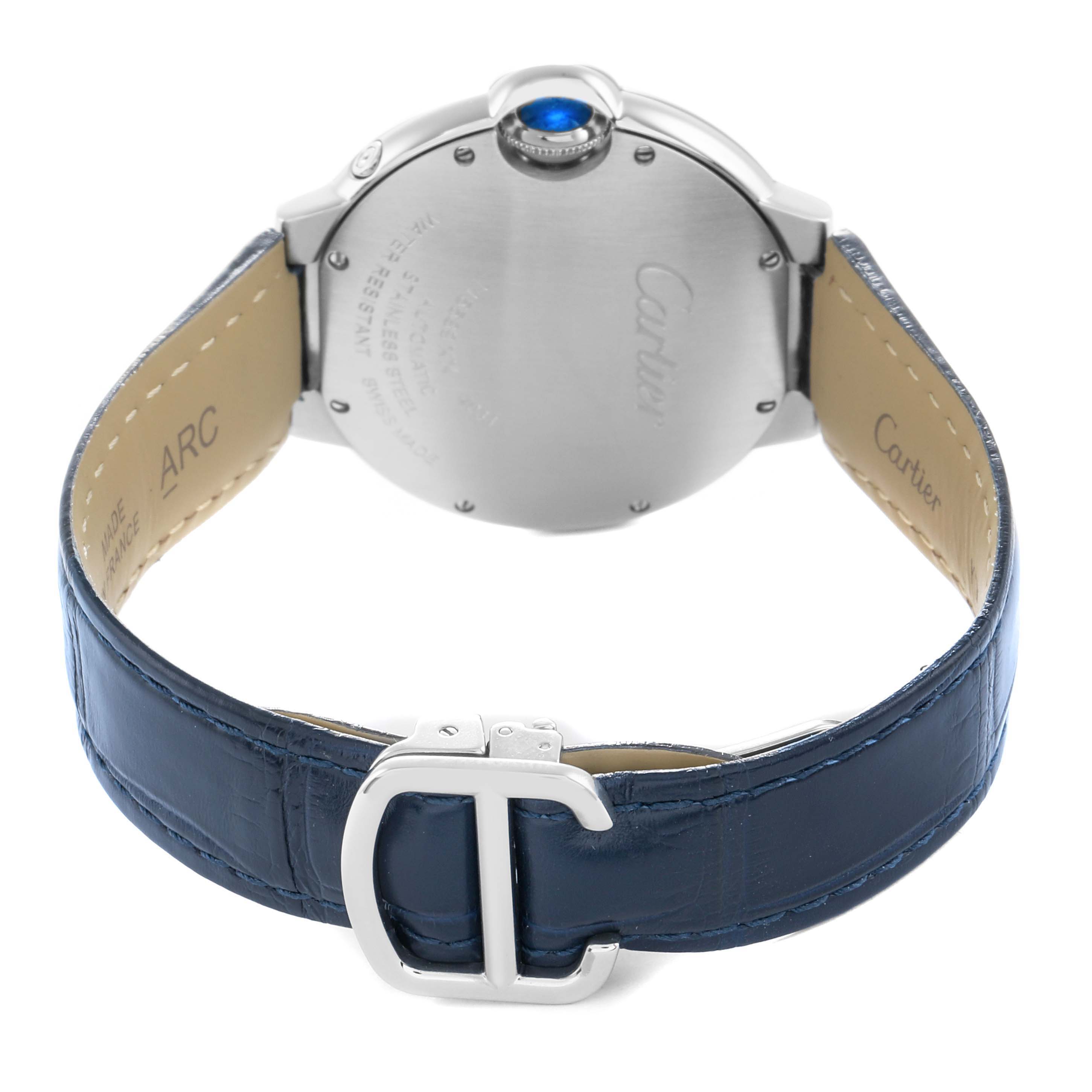 The Cartier Ballon Bleu WSBB0020 Men
s Stainless Steel Silver Dial watch is shown from the back, highlighting the case back, blue leather strap, and distinctive clasp.