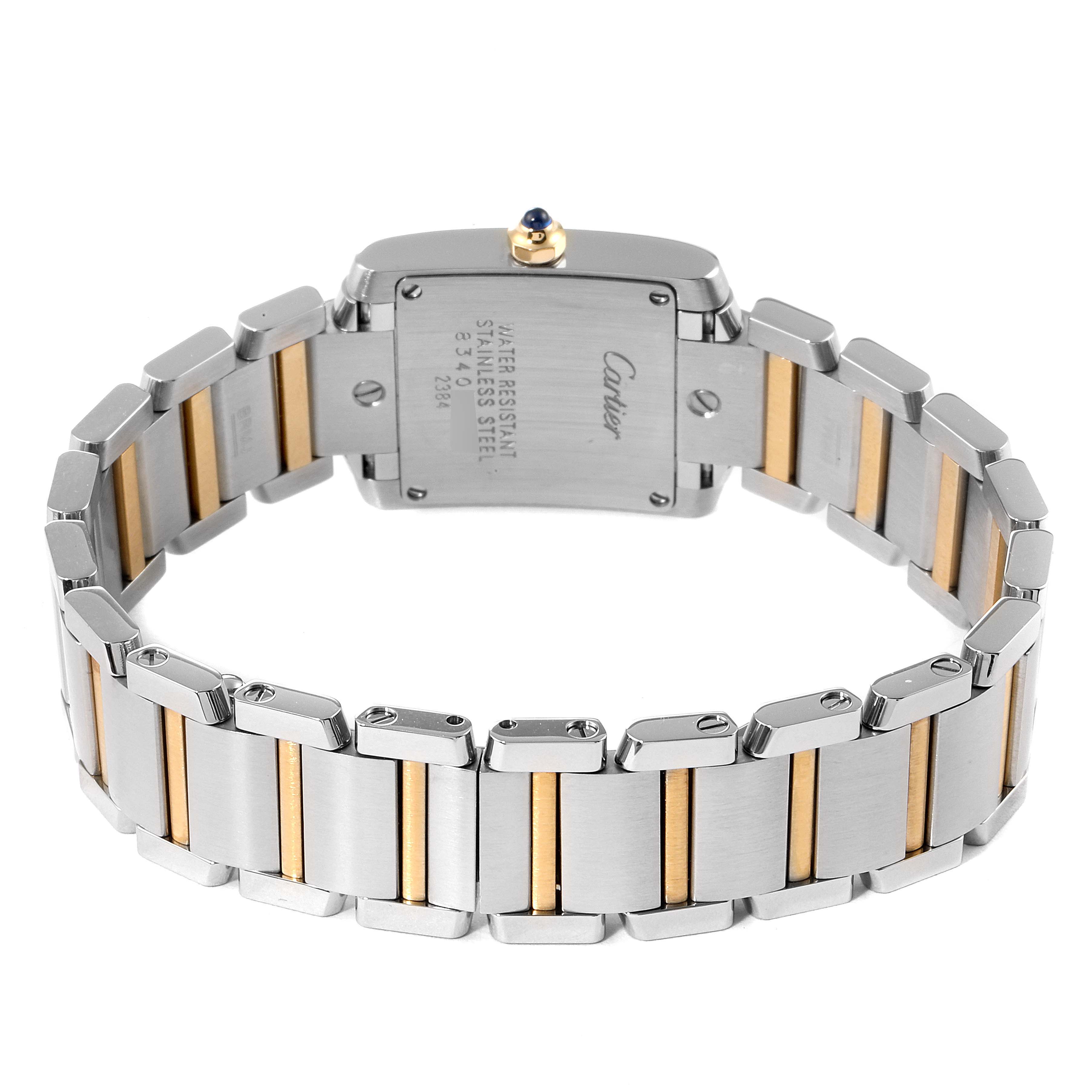 The image shows the back view of a Cartier Tank Francaise W51007Q4 Women
s Steel and Gold (two tone) Silver Dial W51007Q4 Women
s Steel and Gold (two tone) Silver Dial watch, highlighting the stainless steel and gold-tone bracelet and case back.
