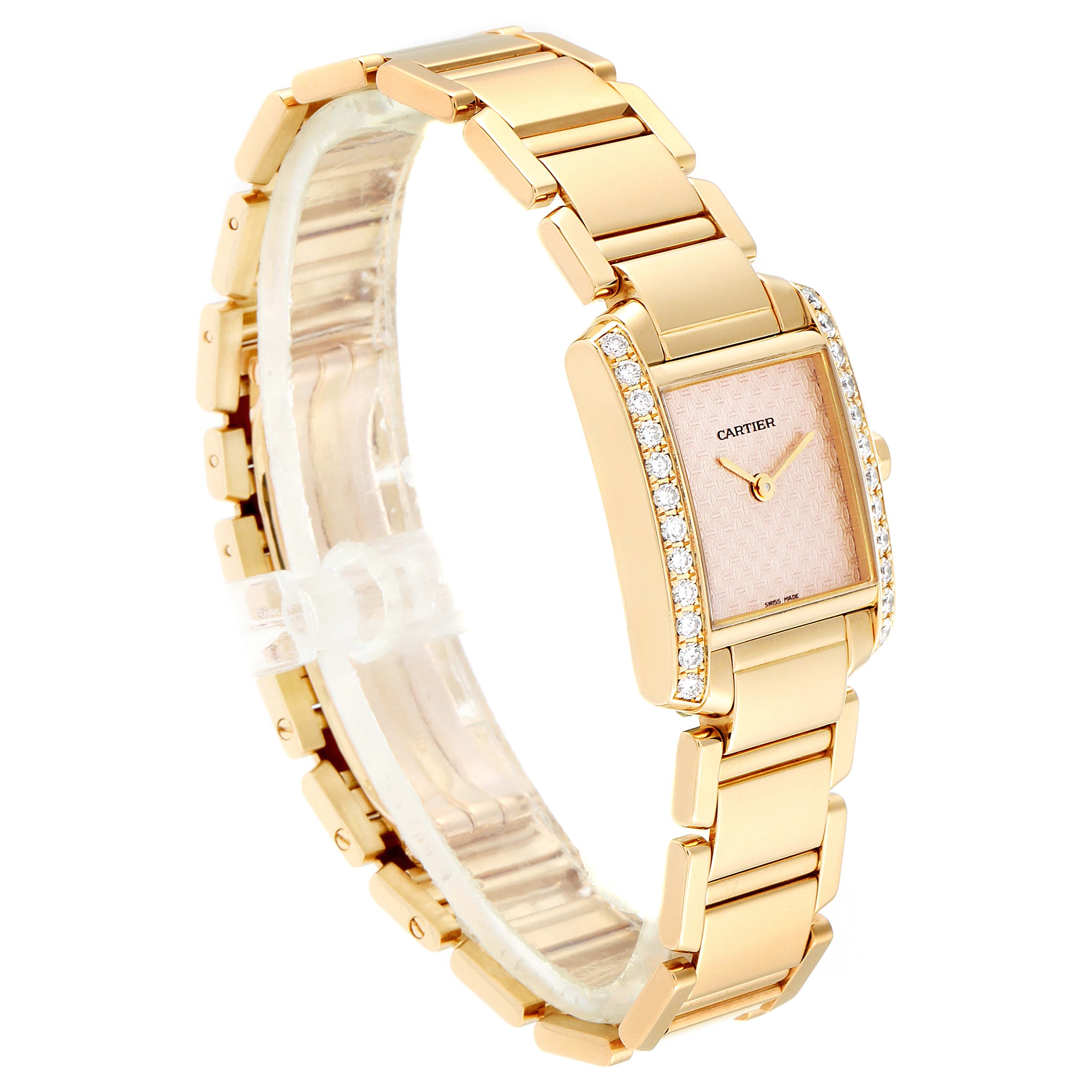 The Cartier Tank Française watch is displayed from an angled side view, showcasing its gold bracelet and diamond-set bezel.