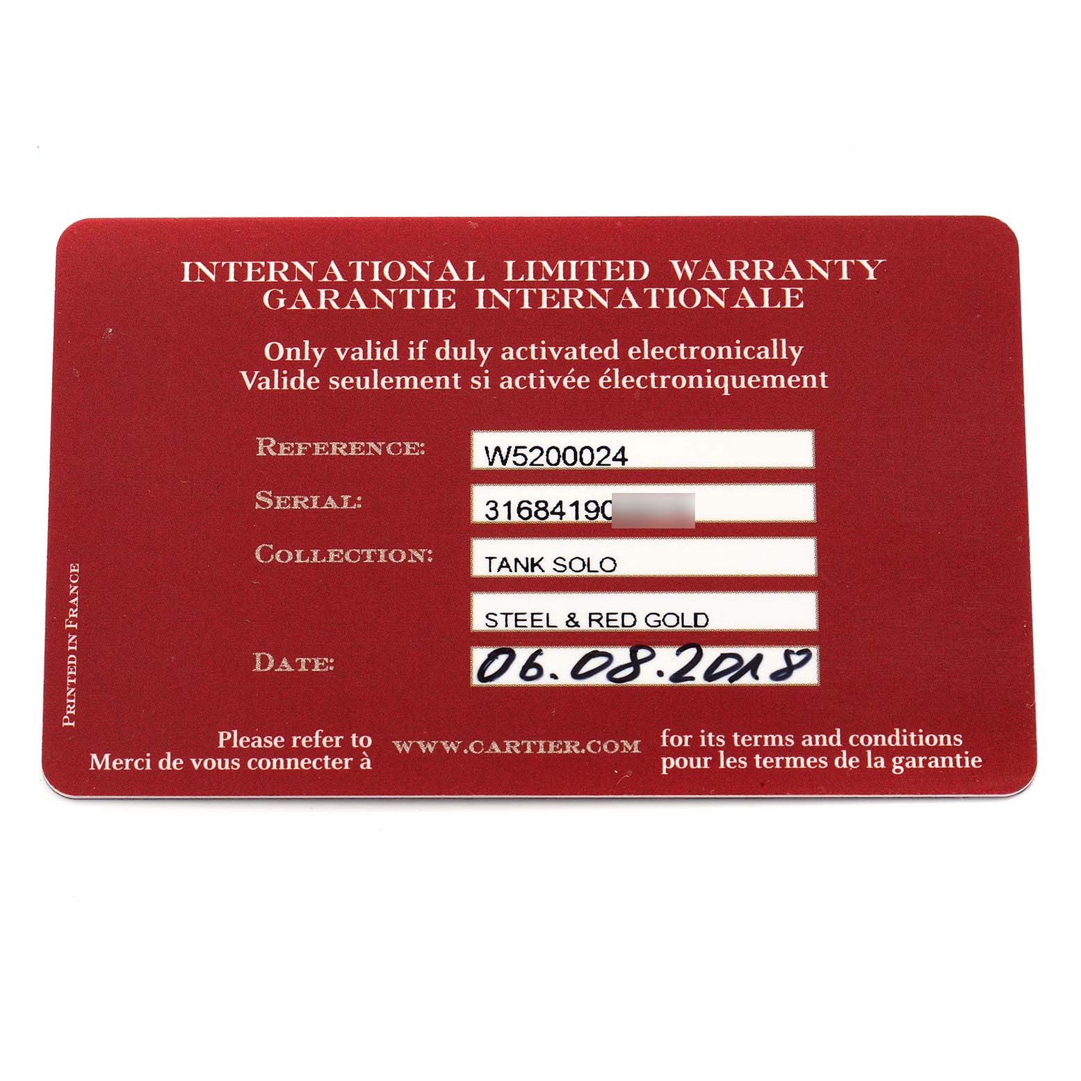 The image shows the international warranty card for the Cartier Tank Solo W5200024 Women
s Steel and Gold (two tone) Silver Dial model.