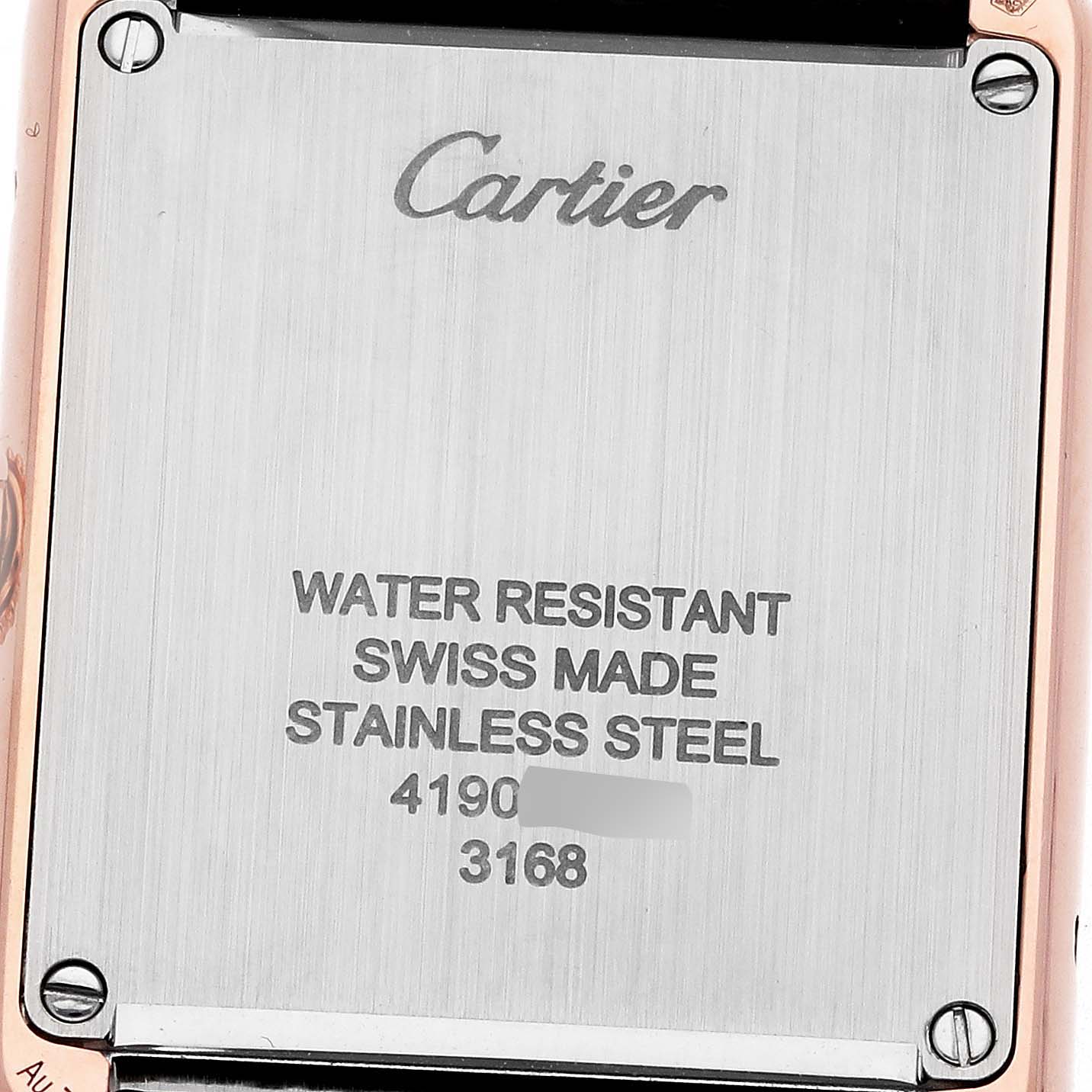 The image shows the back case of the Cartier Tank Solo W5200024 Women
s Steel and Gold (two tone) Silver Dial watch with engraved specifications.