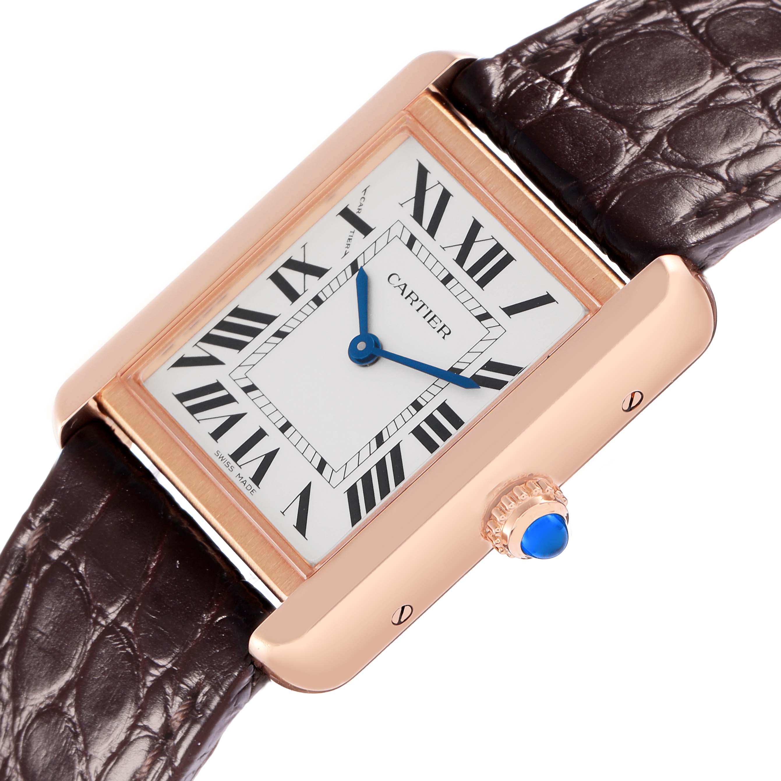 The Cartier Tank Solo W5200024 Women
s Steel and Gold (two tone) Silver Dial watch is shown from an angled top view, highlighting the face, casing, crown, and strap prominently.