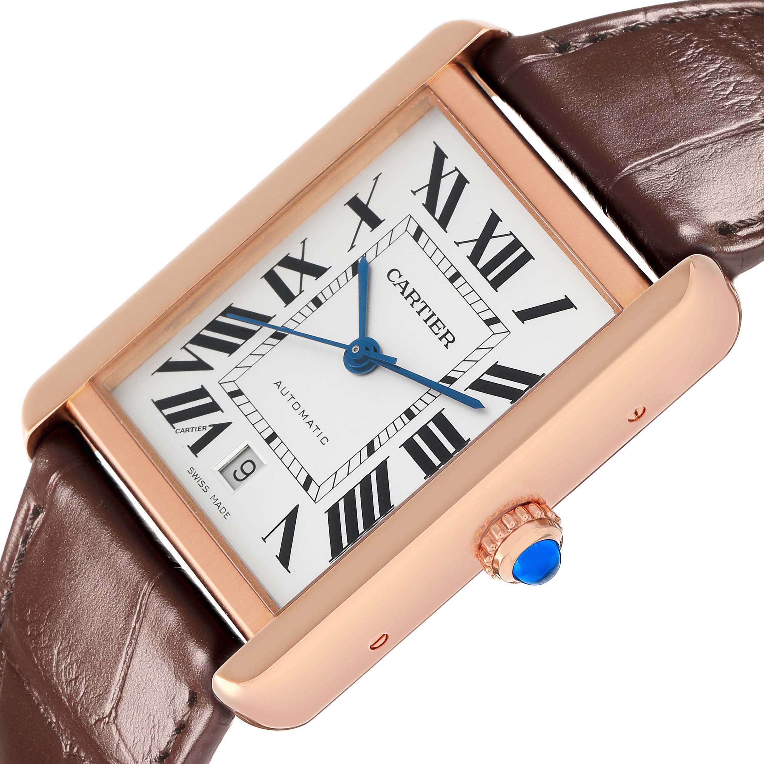 The Cartier Tank Solo W5200026 Men
s Steel and Gold (two tone) Silver Dial watch is shown at an angle highlighting the face, crown, and part of the leather strap.