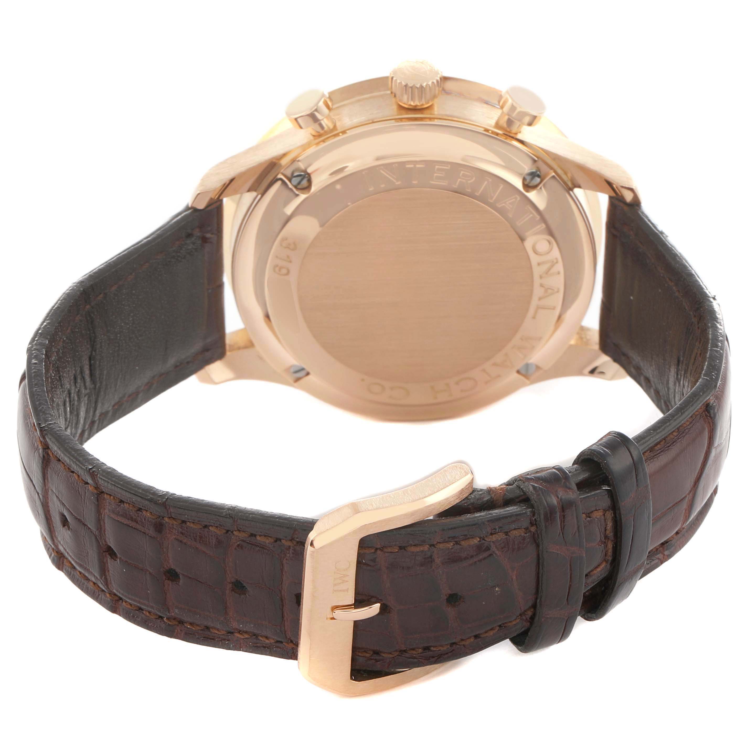 The image shows the back of the IWC Portuguese IW371480 Men
s Rose Gold Silver Dial watch, highlighting the case back, crown, lugs, and brown leather strap with a clasp.