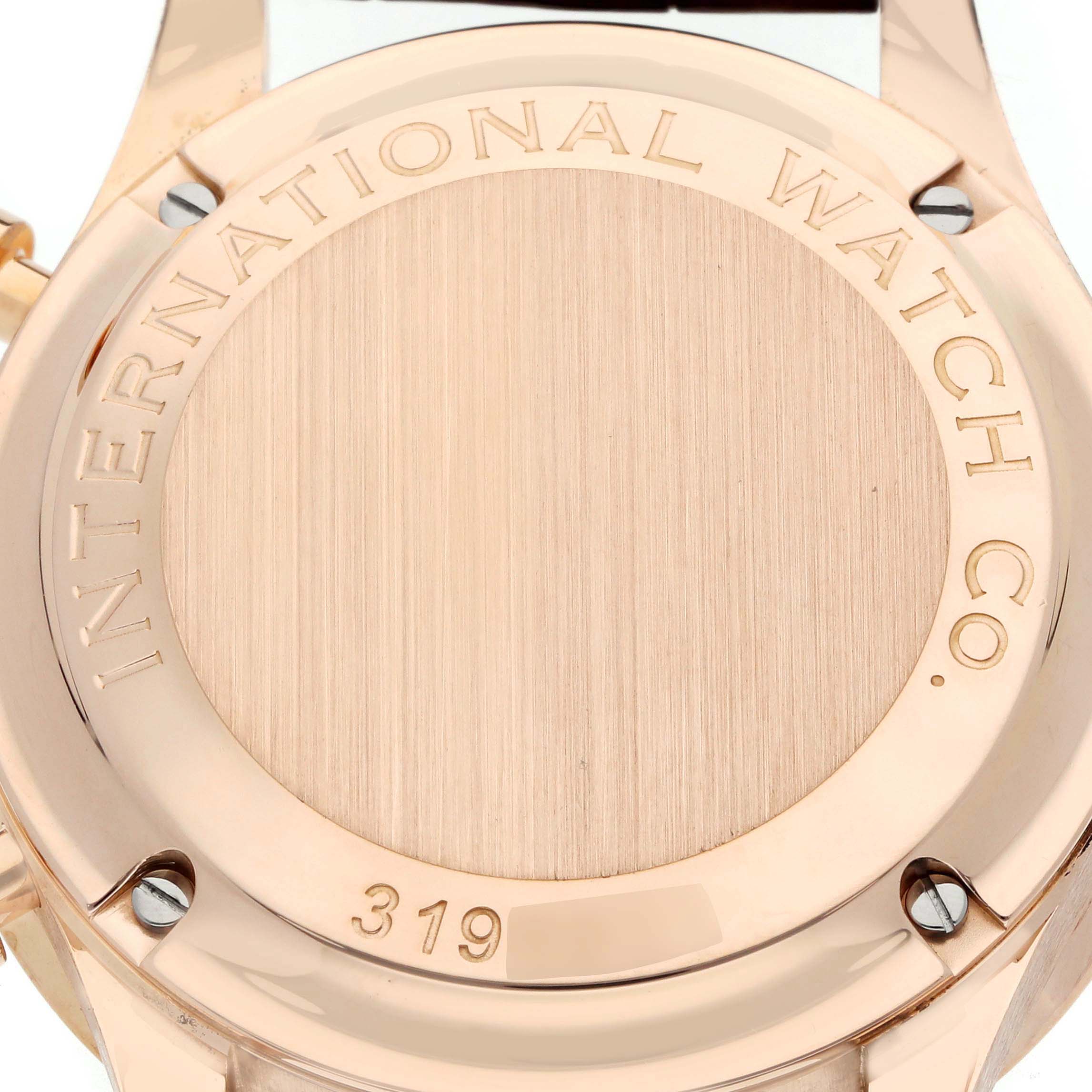 The image shows the caseback of an IWC Portuguese IW371480 Men
s Rose Gold Silver Dial watch, highlighting its brushed and polished finish.