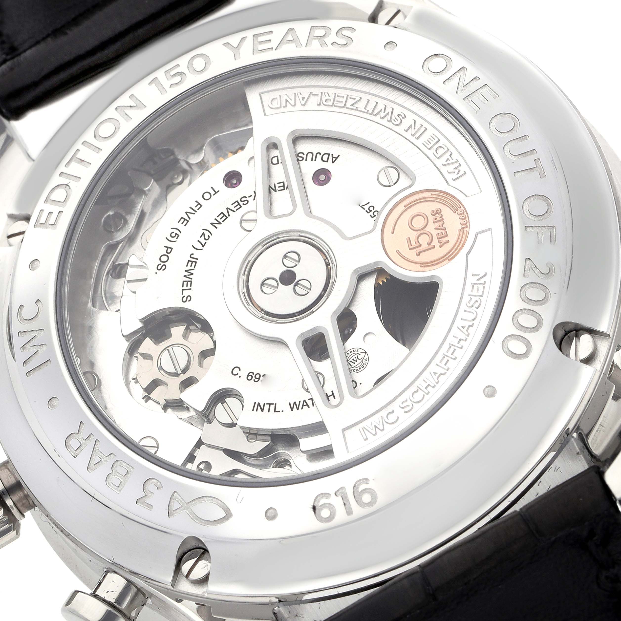 The image shows the back of the IWC Portuguese IW371601 Men
s Stainless Steel Blue Dial model, highlighting the movement and the 150 Years edition markings.